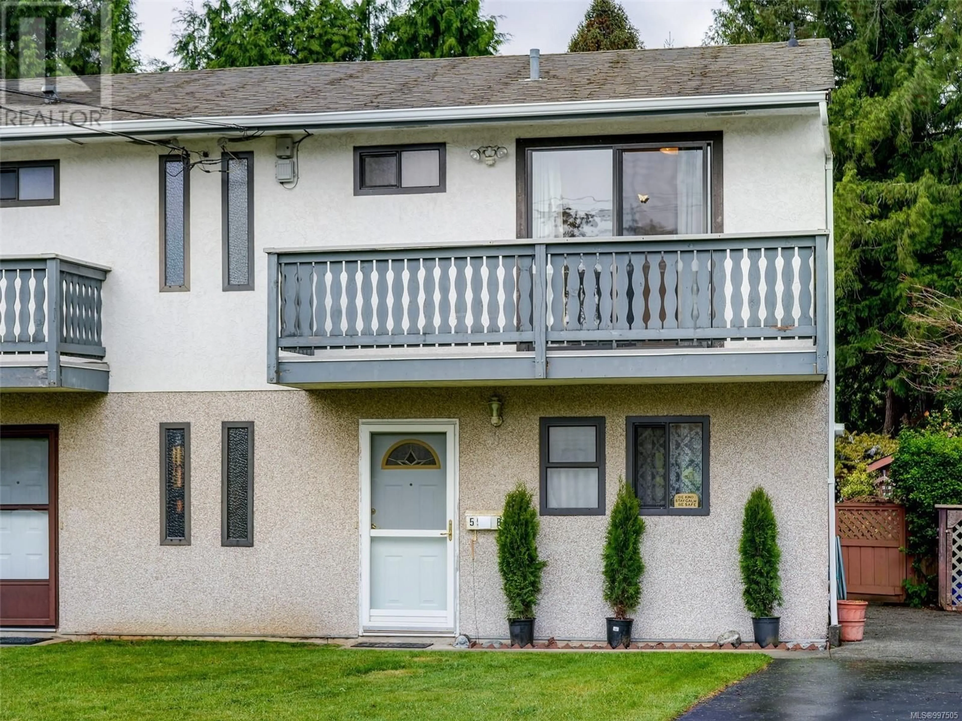 Home with vinyl exterior material, street for 595B RIDLEY DRIVE, Colwood British Columbia V9C1K5