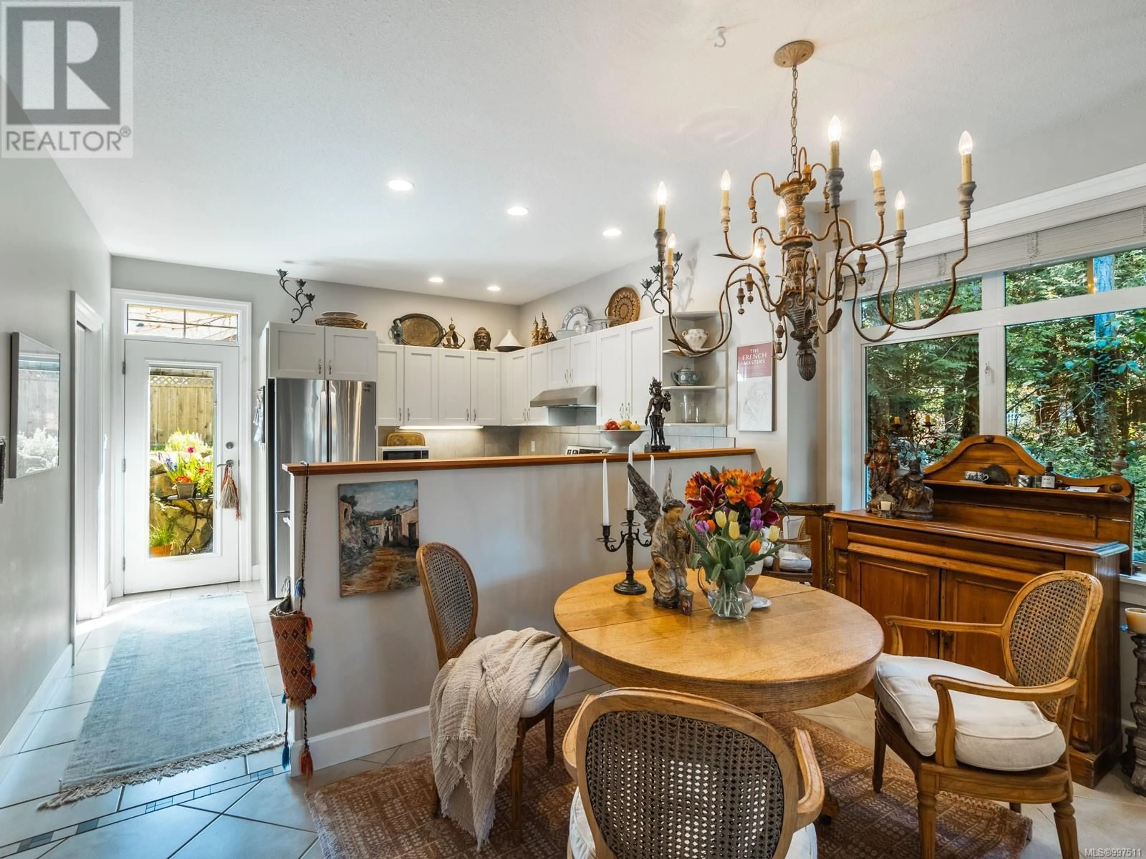 Open concept kitchen, ceramic/tile floor for 150 HARLECH ROAD, Qualicum Beach British Columbia V9K1G9