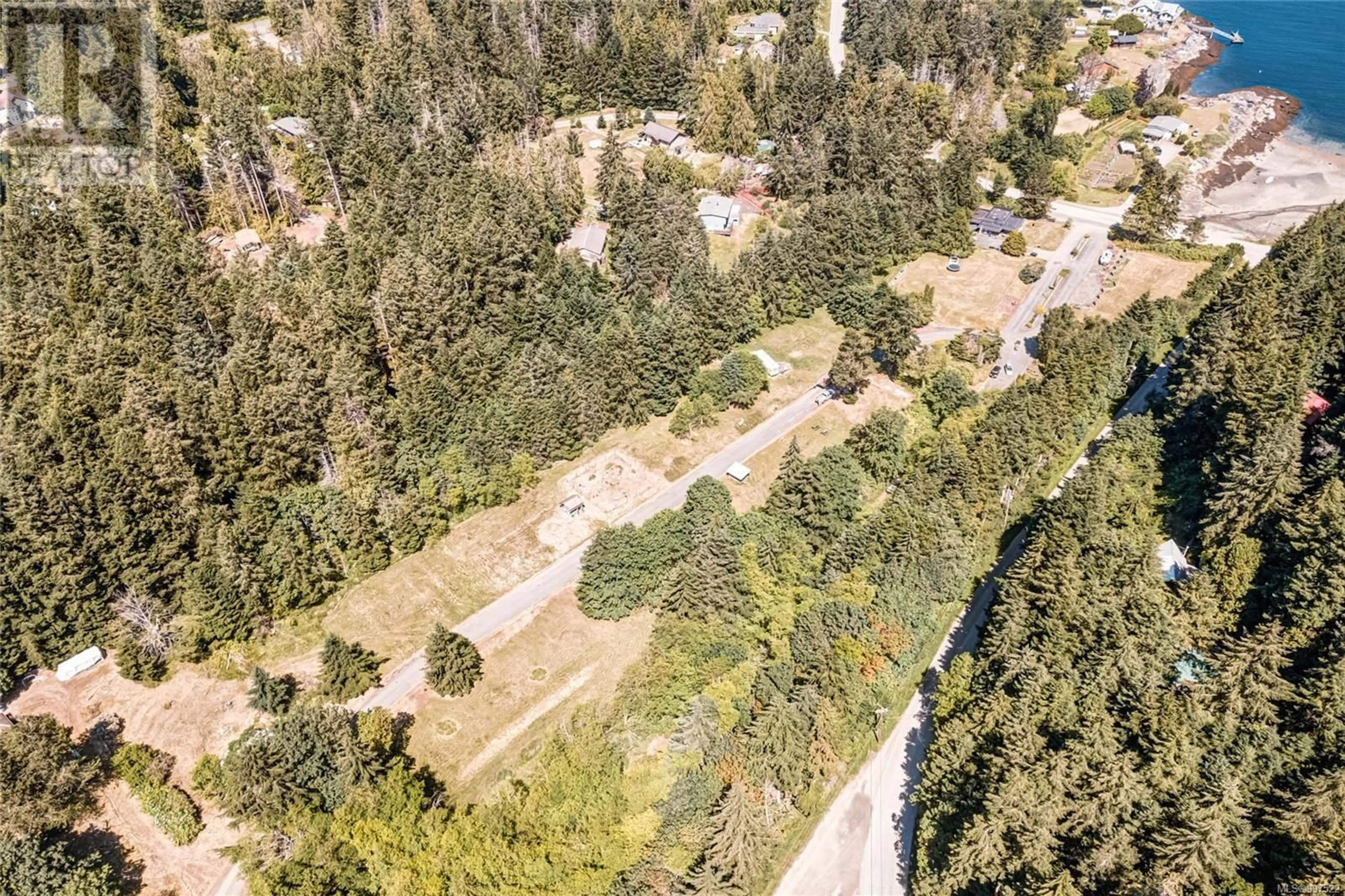 A pic from outside/outdoor area/front of a property/back of a property/a pic from drone, forest/trees view for 215 EASTHOM ROAD, Gabriola Island British Columbia V0R1X2