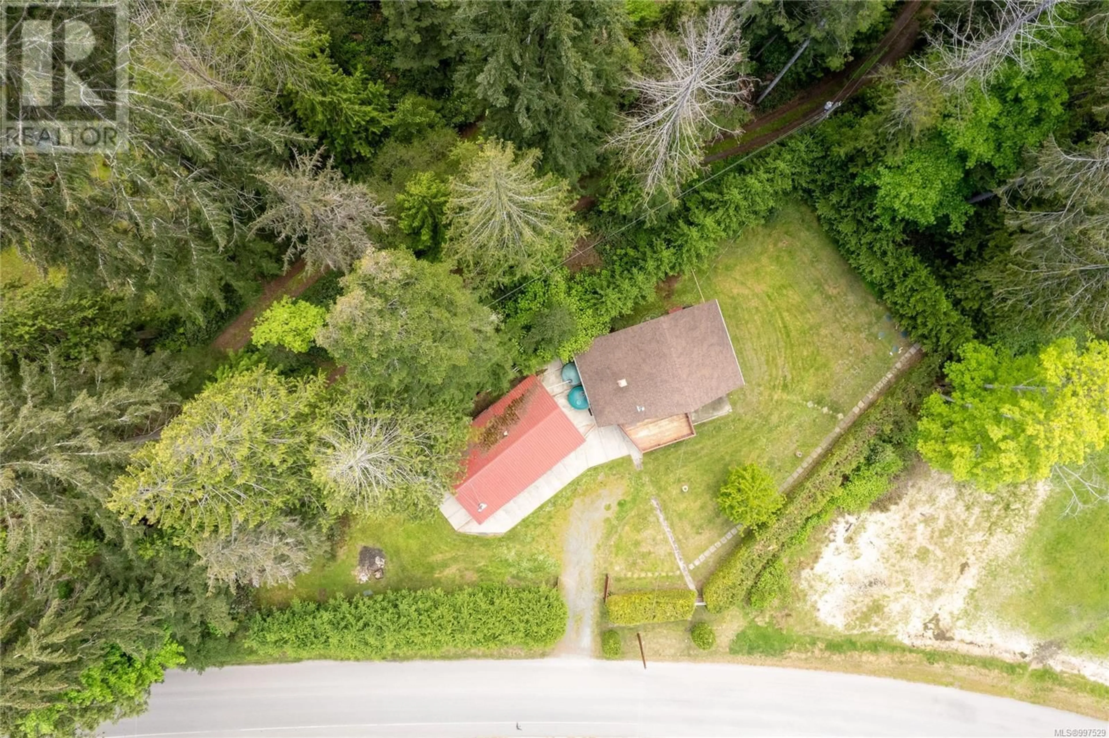 A pic from outside/outdoor area/front of a property/back of a property/a pic from drone, forest/trees view for 255 RICARDO ROAD, Gabriola Island British Columbia V0R1X1