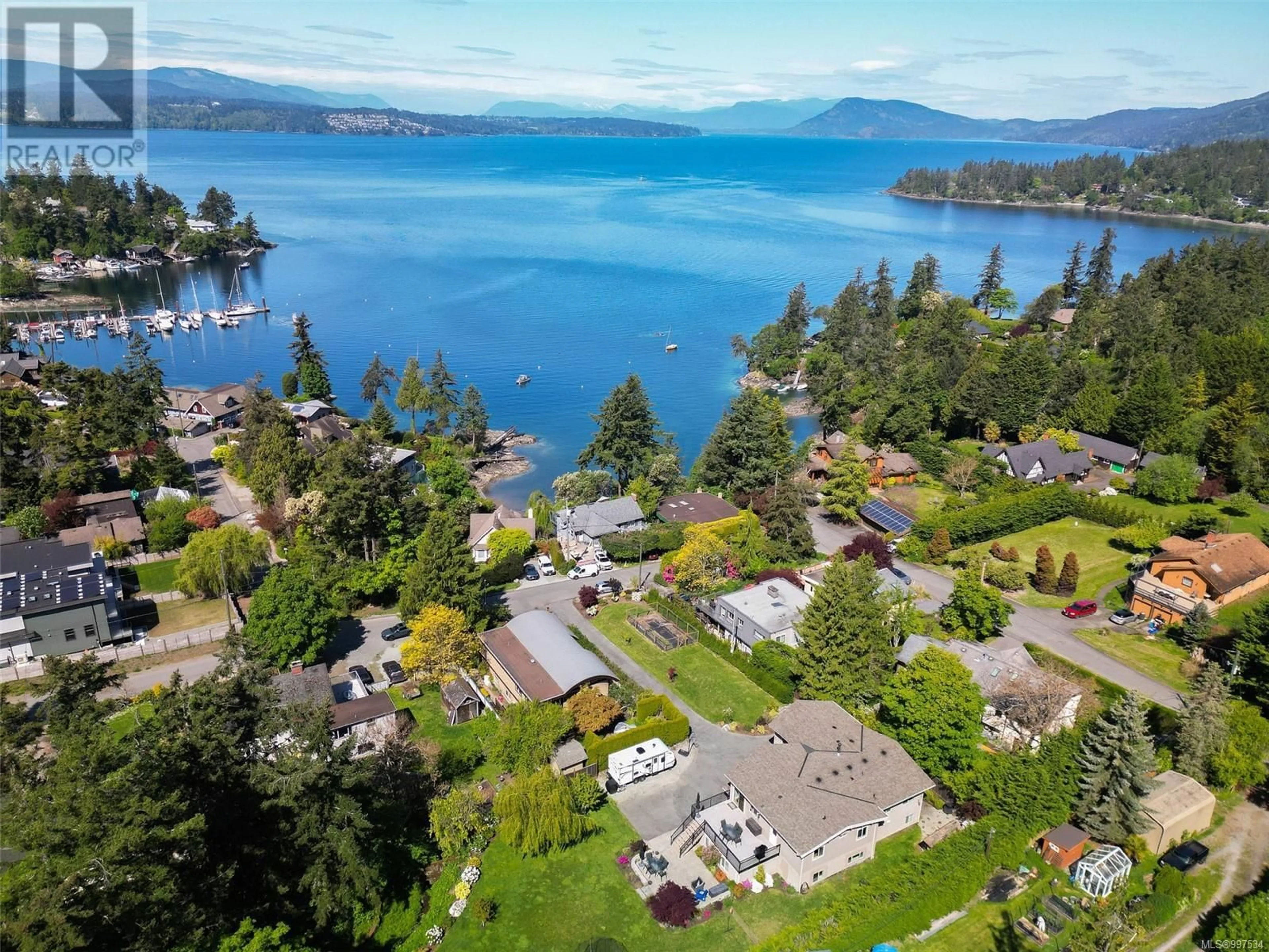 A pic from outside/outdoor area/front of a property/back of a property/a pic from drone, water/lake/river/ocean view for 10985 KALITAN ROAD, North Saanich British Columbia V8L5V8