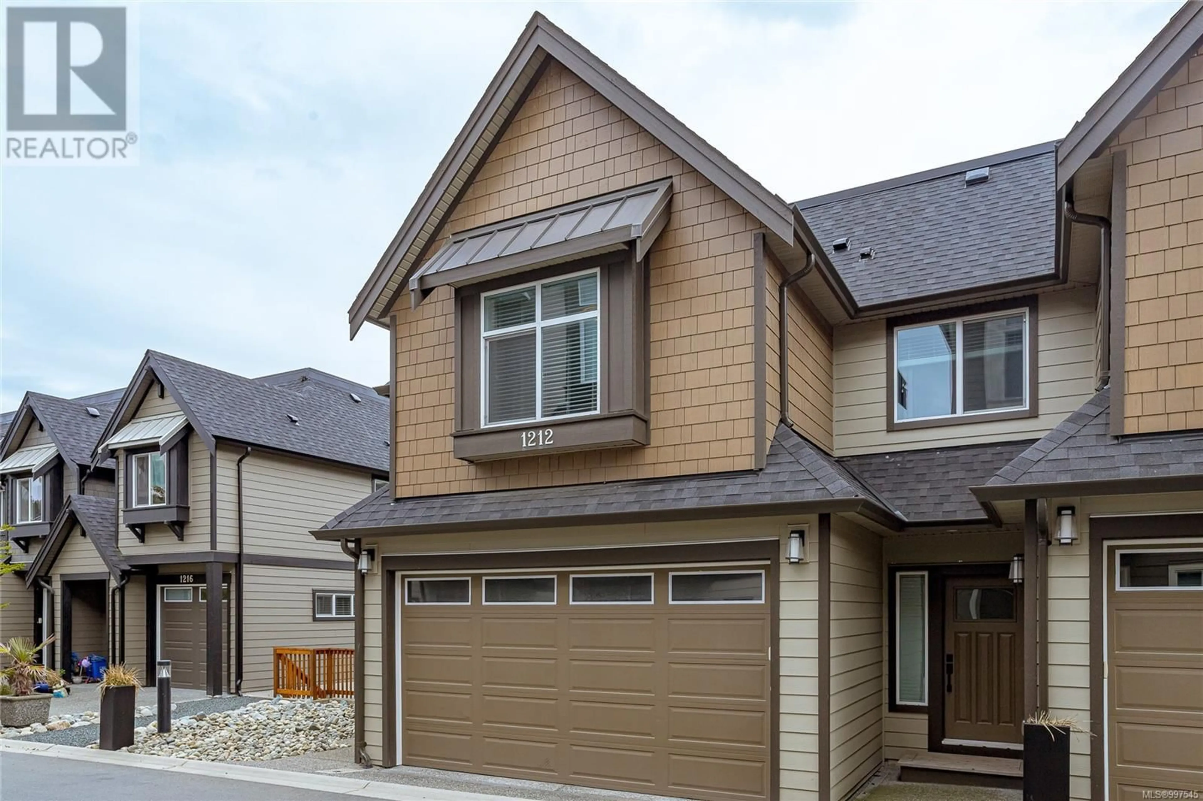 Home with vinyl exterior material, street for 1212 MOONSTONE LOOP, Langford British Columbia V9B0Y6