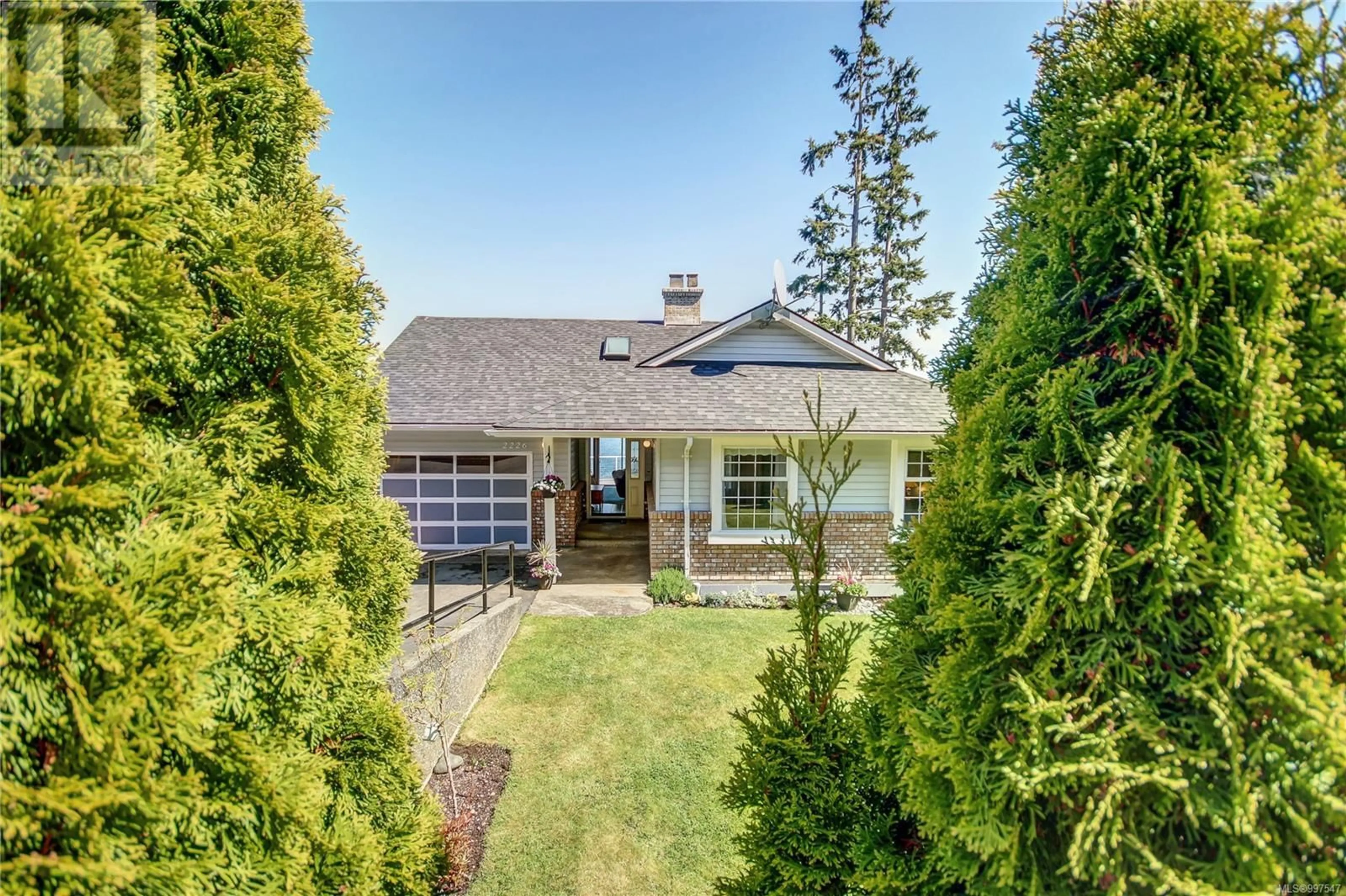 A pic from outside/outdoor area/front of a property/back of a property/a pic from drone, street for 2226 BEACH DRIVE, Port McNeill British Columbia V0N2R0