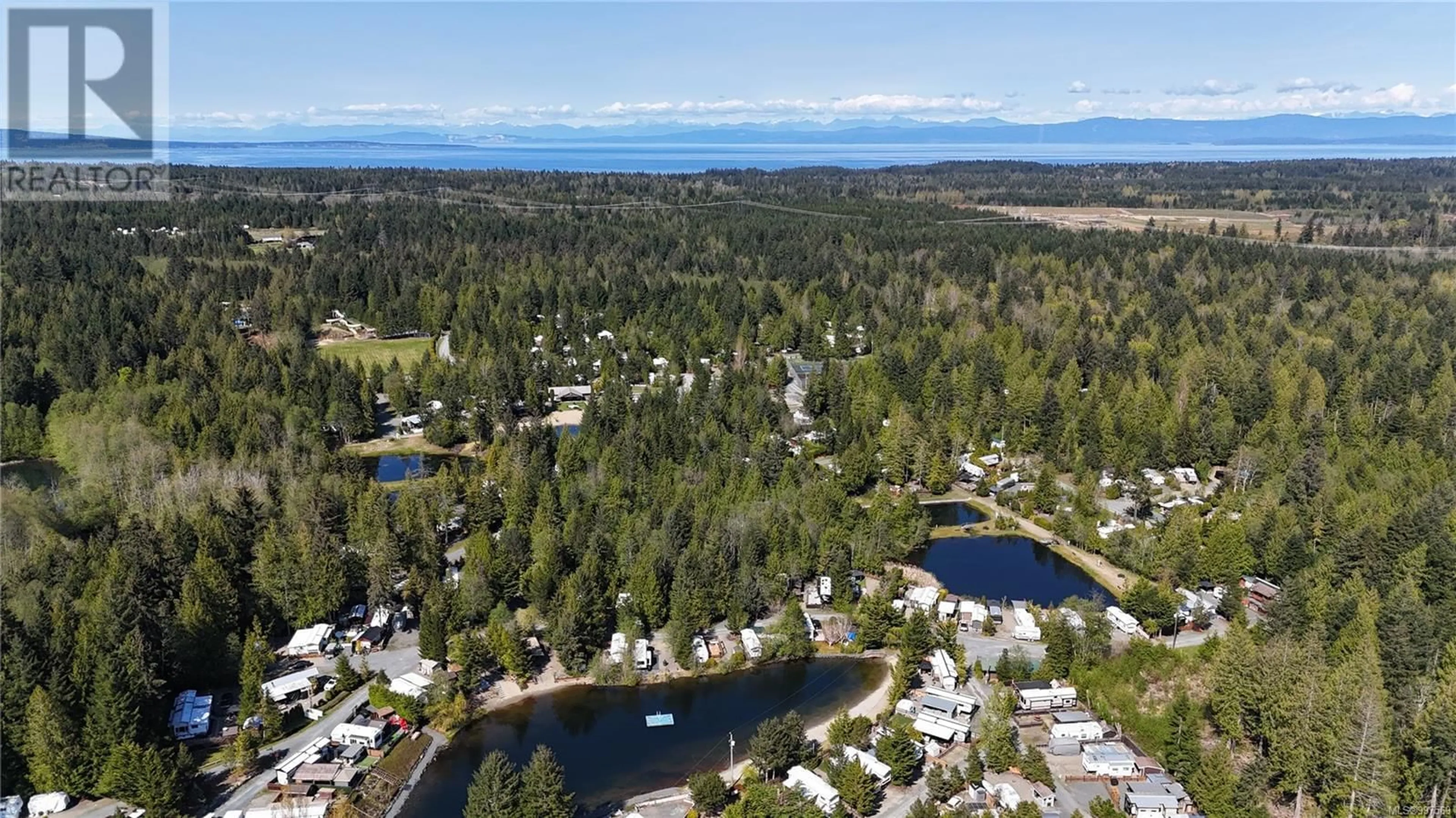 A pic from outside/outdoor area/front of a property/back of a property/a pic from drone, water/lake/river/ocean view for B37 - 2650 TURNBULL ROAD, Qualicum Beach British Columbia V9K2R2