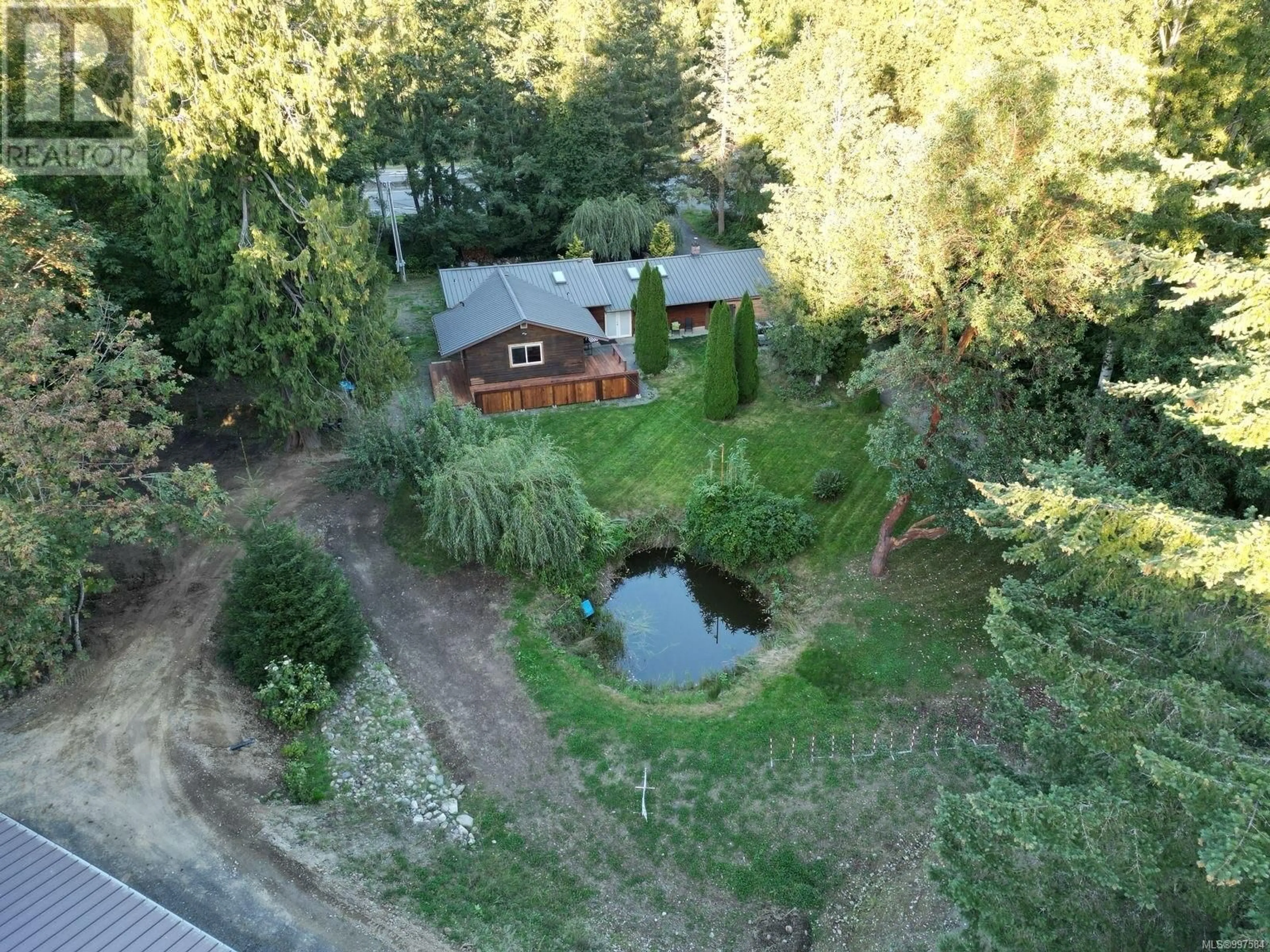 A pic from outside/outdoor area/front of a property/back of a property/a pic from drone, water/lake/river/ocean view for 3420 TRANS CANADA HIGHWAY, Cobble Hill British Columbia V0R1L0