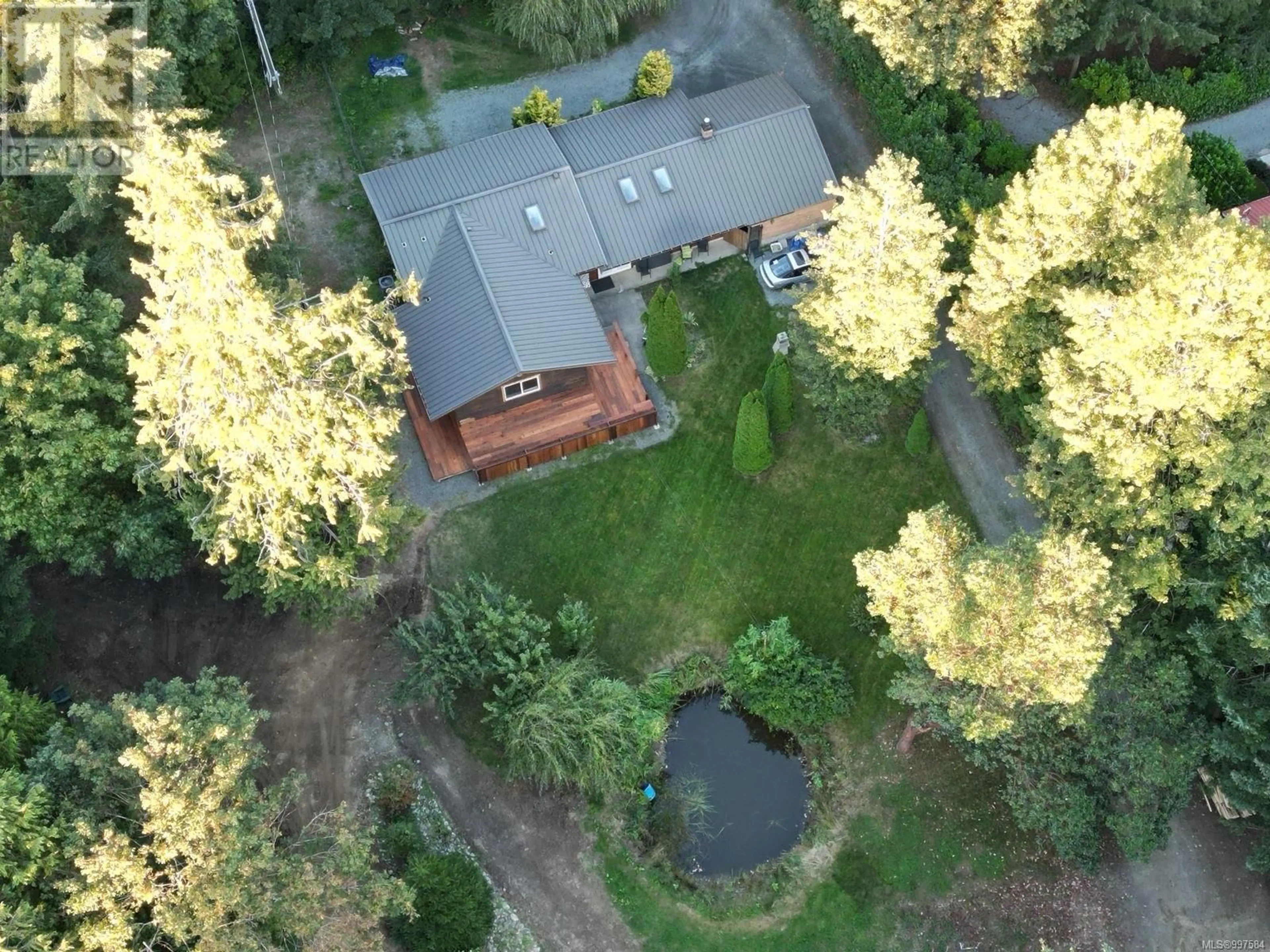 A pic from outside/outdoor area/front of a property/back of a property/a pic from drone, forest/trees view for 3420 TRANS CANADA HIGHWAY, Cobble Hill British Columbia V0R1L0