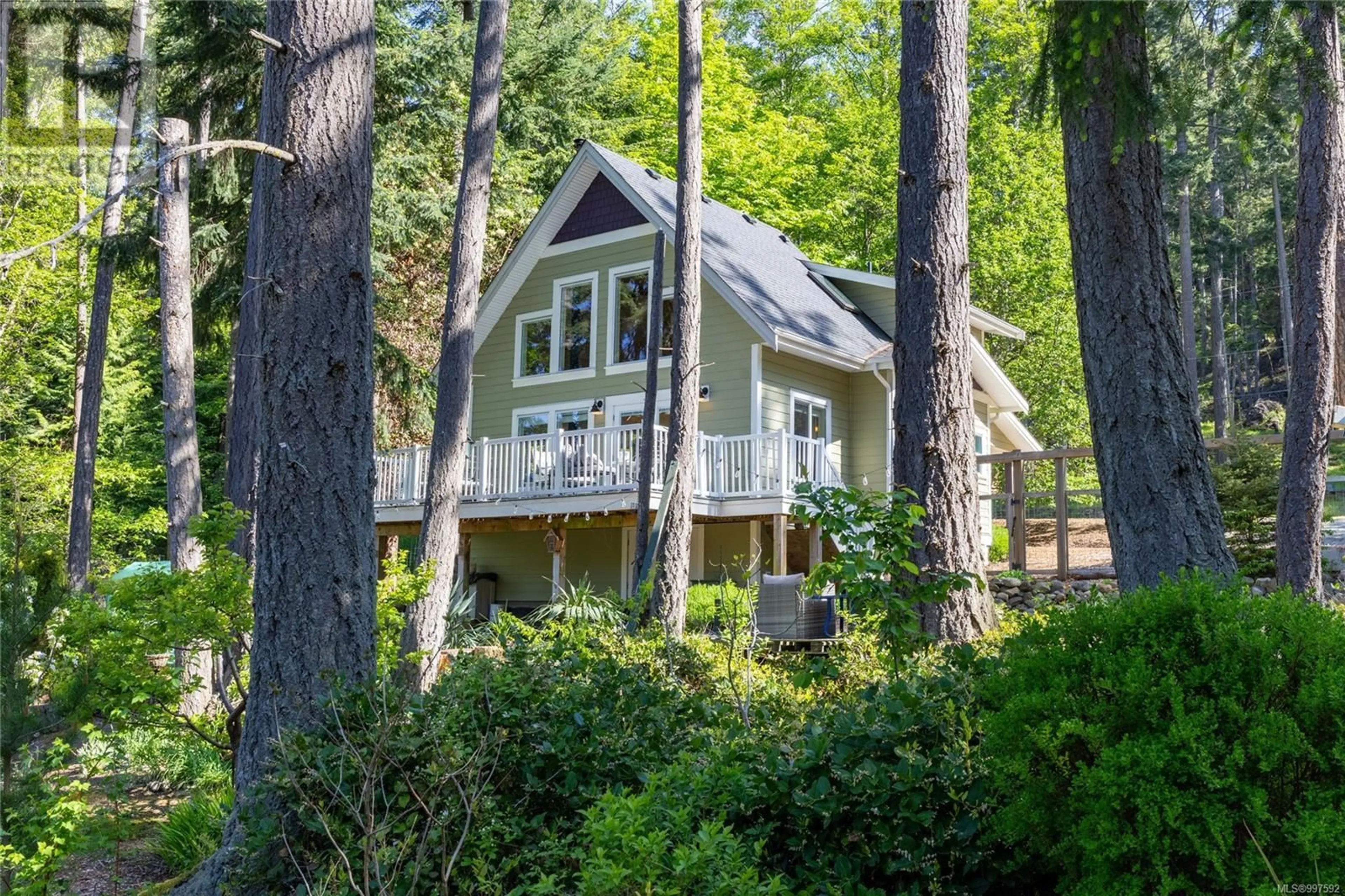 Home with vinyl exterior material, forest/trees view for 2643 SHOAL ROAD, Pender Island British Columbia V0N2M2