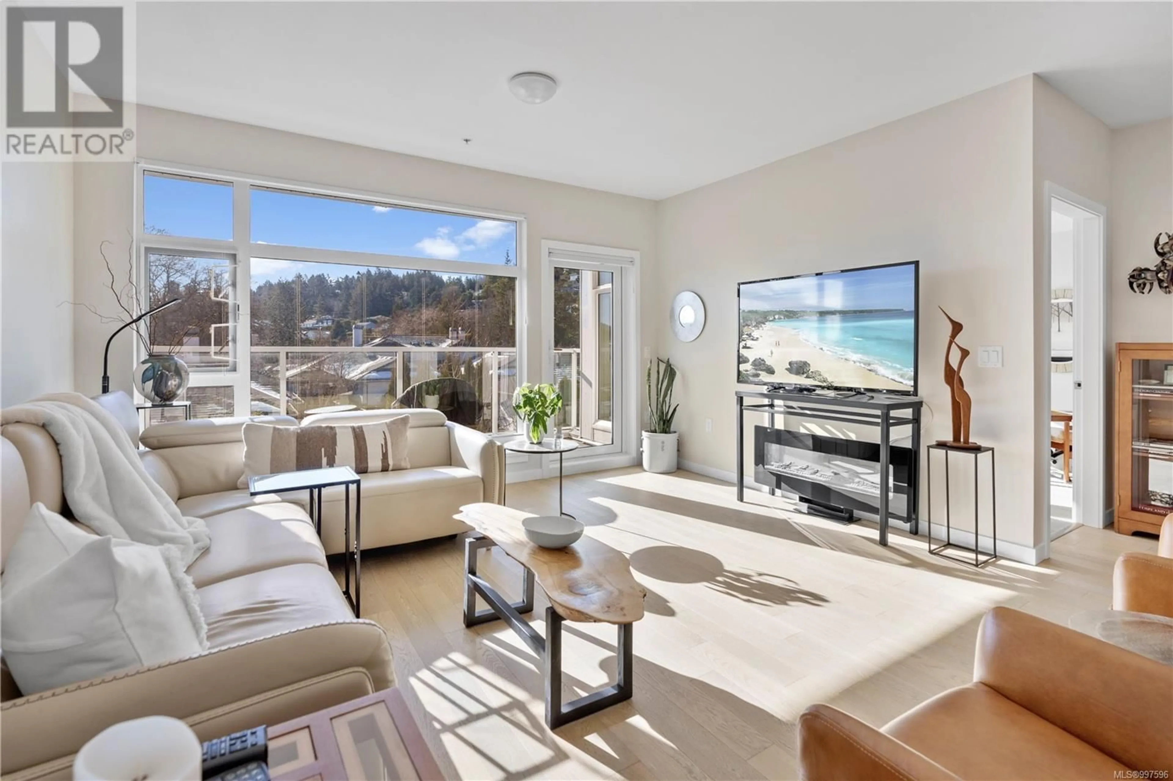 Living room with furniture, unknown for 208 - 5118 CORDOVA BAY ROAD, Saanich British Columbia V8X1R1