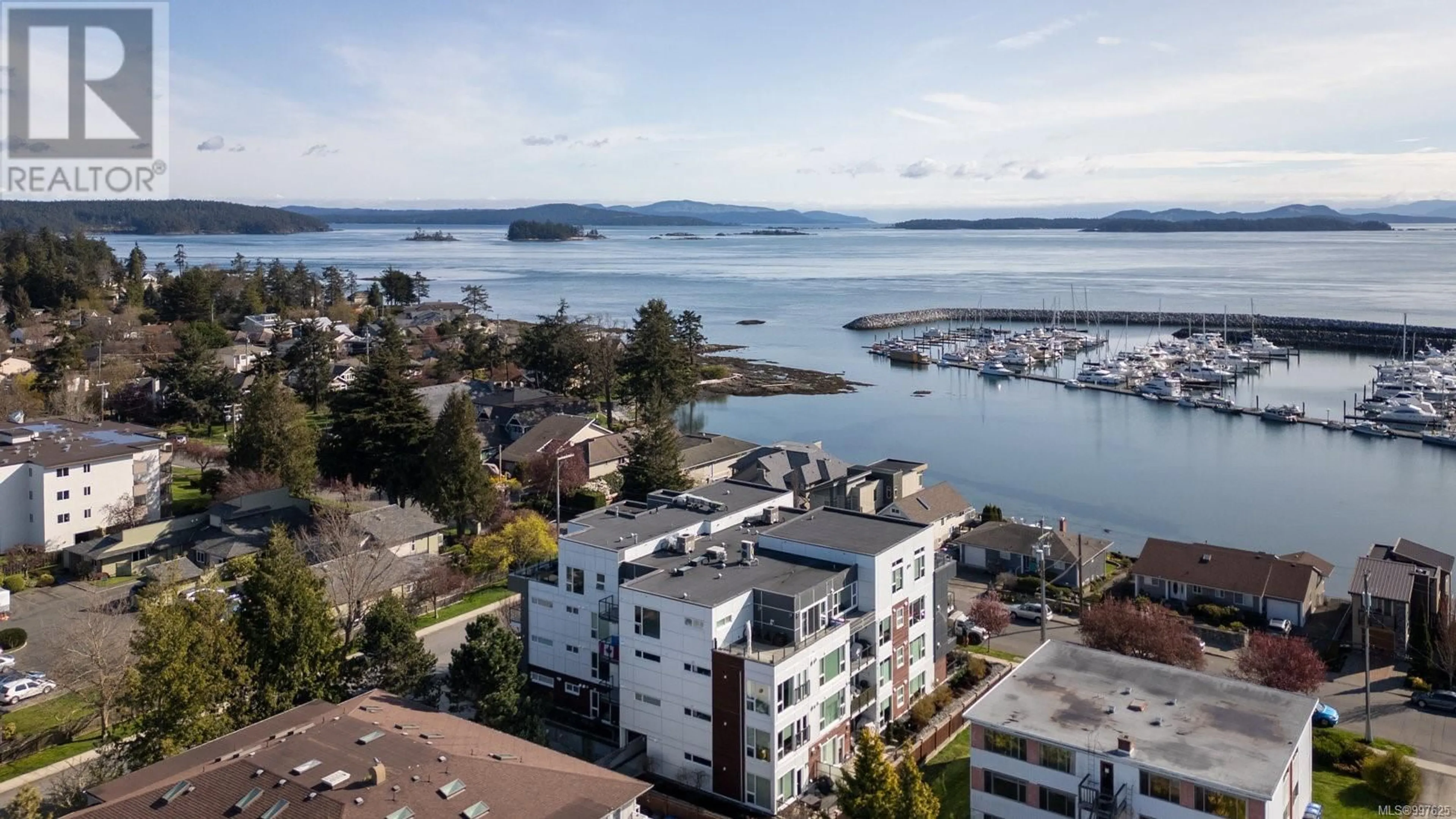 A pic from outside/outdoor area/front of a property/back of a property/a pic from drone, water/lake/river/ocean view for 206 - 2447 HENRY AVENUE, Sidney British Columbia V8L4N3