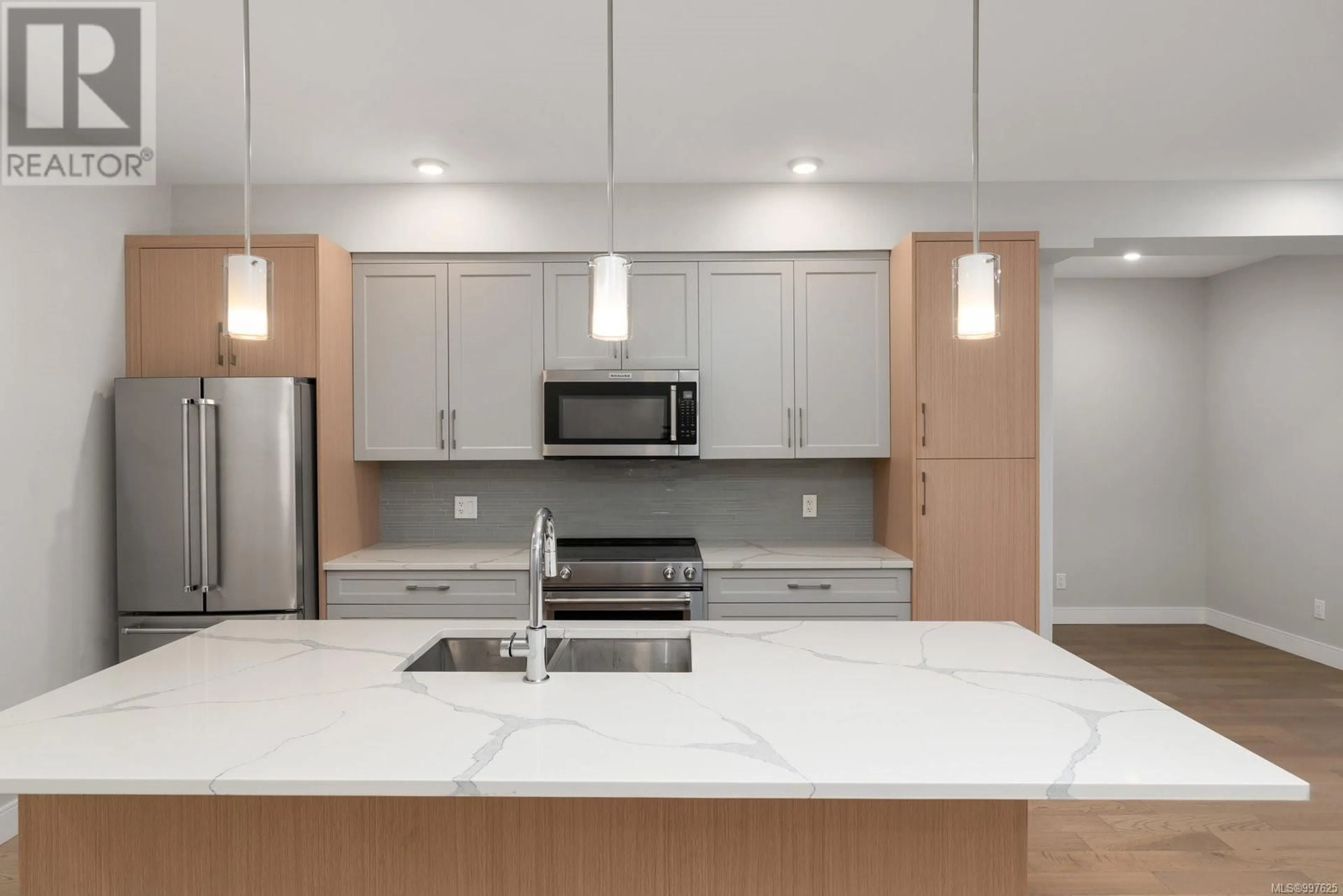 Open concept kitchen, ceramic/tile floor for 206 - 2447 HENRY AVENUE, Sidney British Columbia V8L4N3