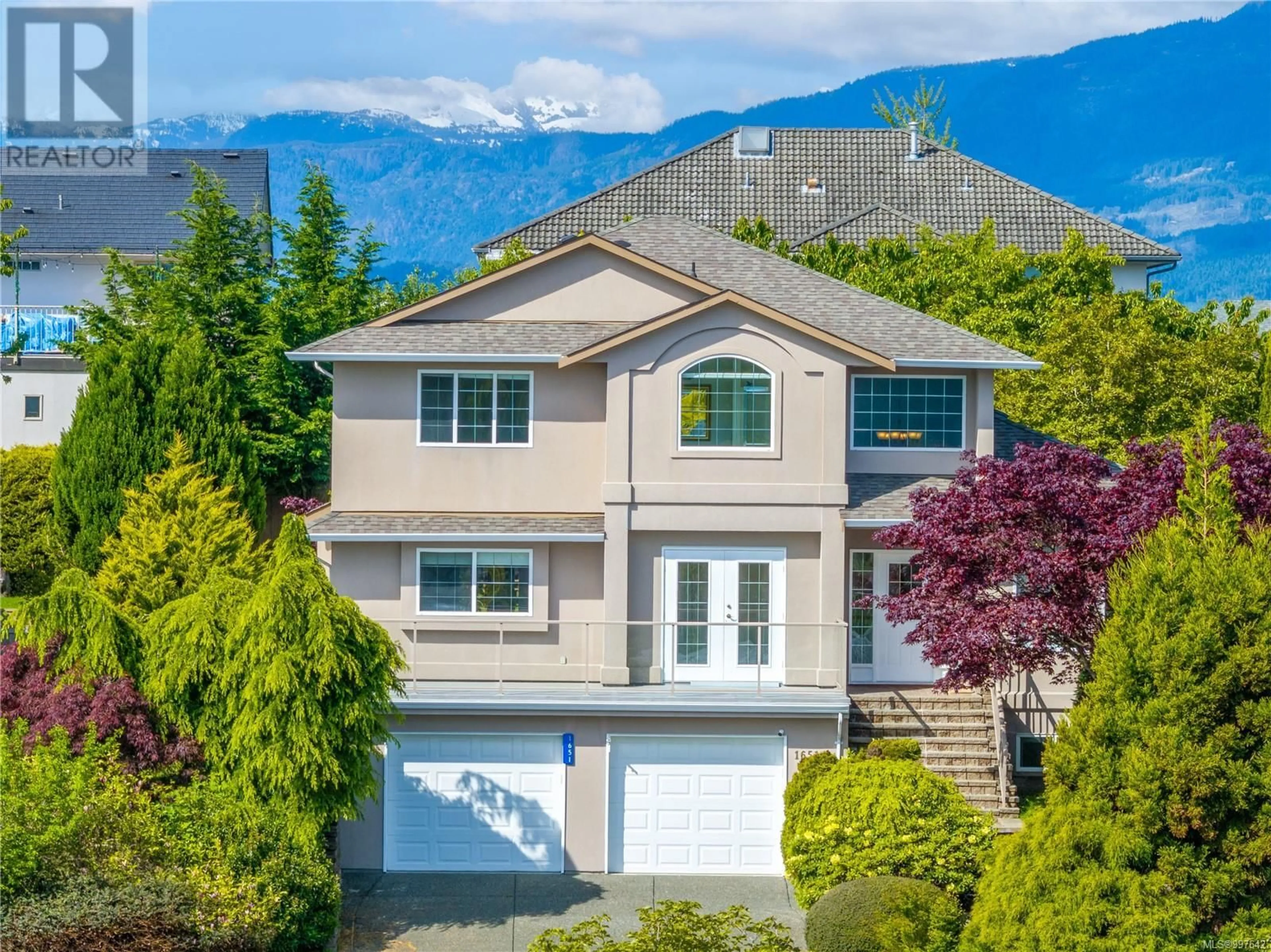 A pic from outside/outdoor area/front of a property/back of a property/a pic from drone, mountain view for 1651 SWAN CRESCENT, Courtenay British Columbia V9N9A7