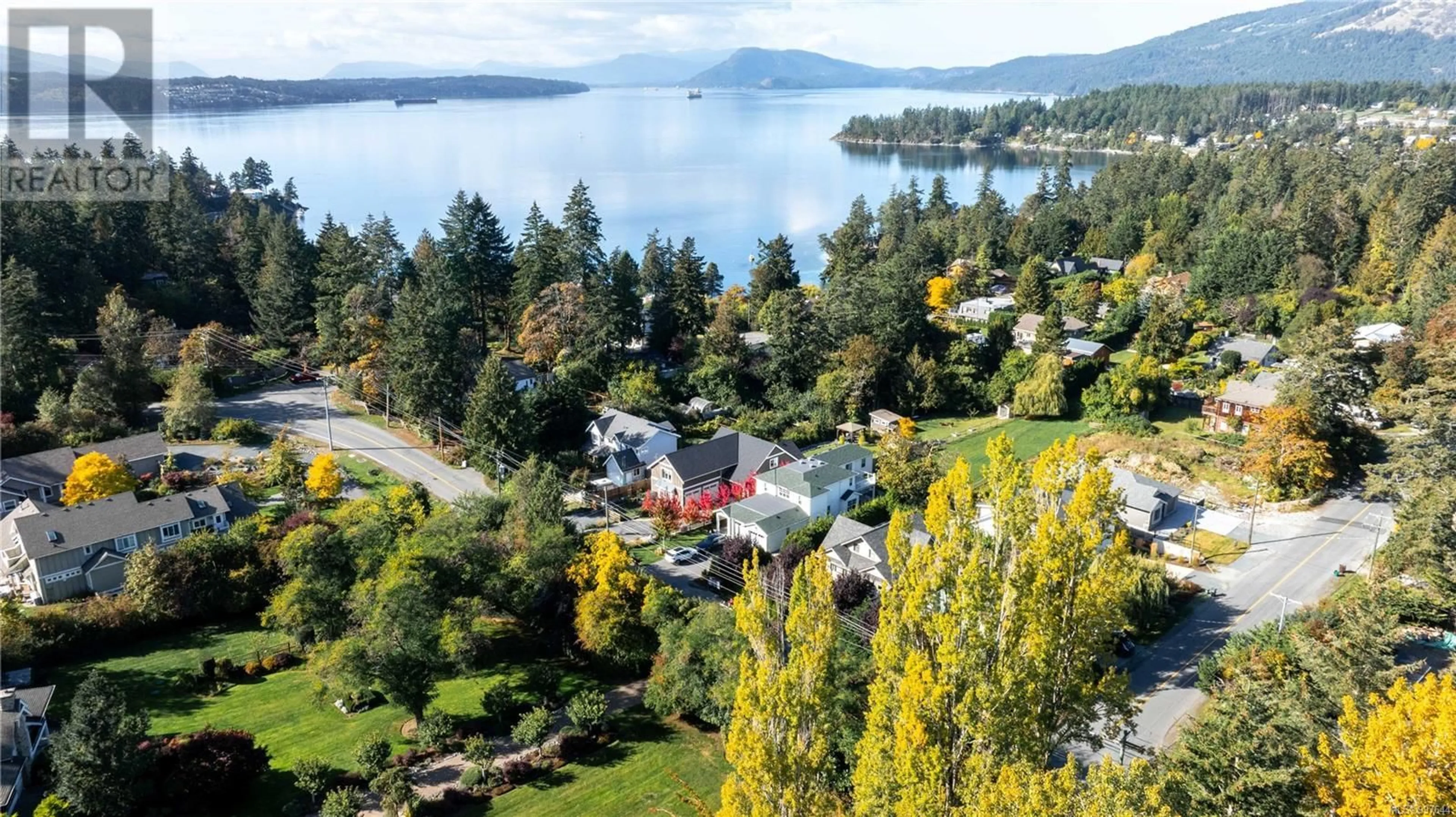 A pic from outside/outdoor area/front of a property/back of a property/a pic from drone, water/lake/river/ocean view for 648 BIRCH ROAD, North Saanich British Columbia V8L5S2