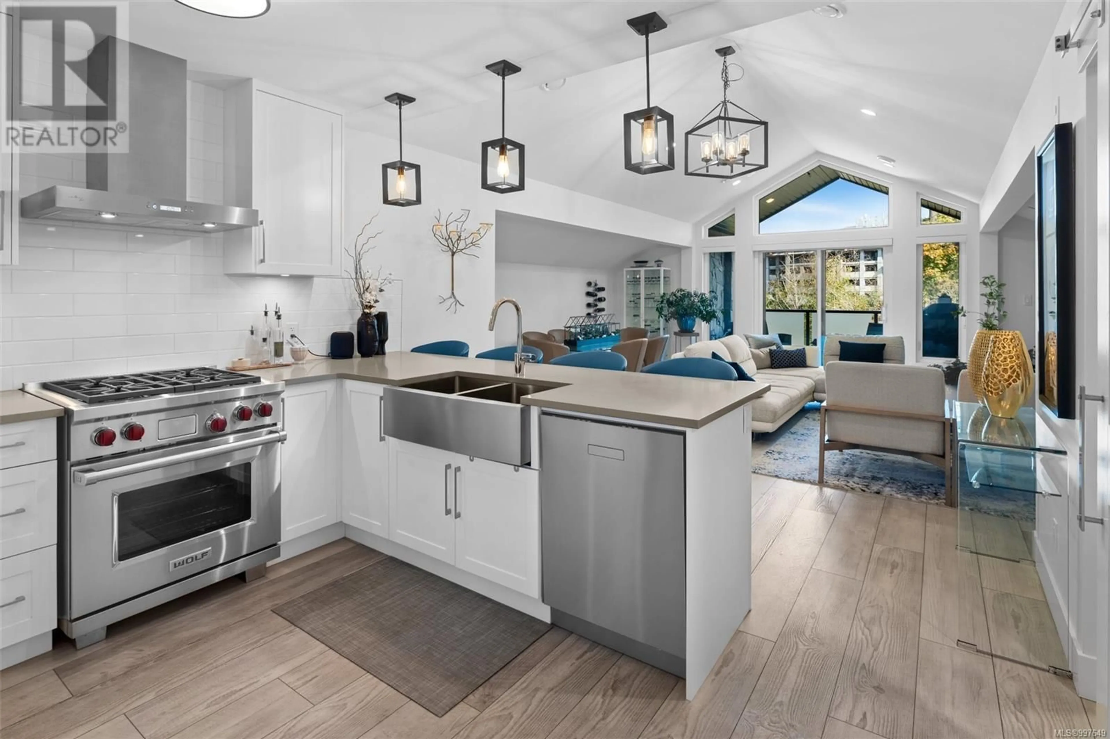 Open concept kitchen, ceramic/tile floor for 201 - 2045 COUNTRY CLUB WAY, Langford British Columbia V9B6R3