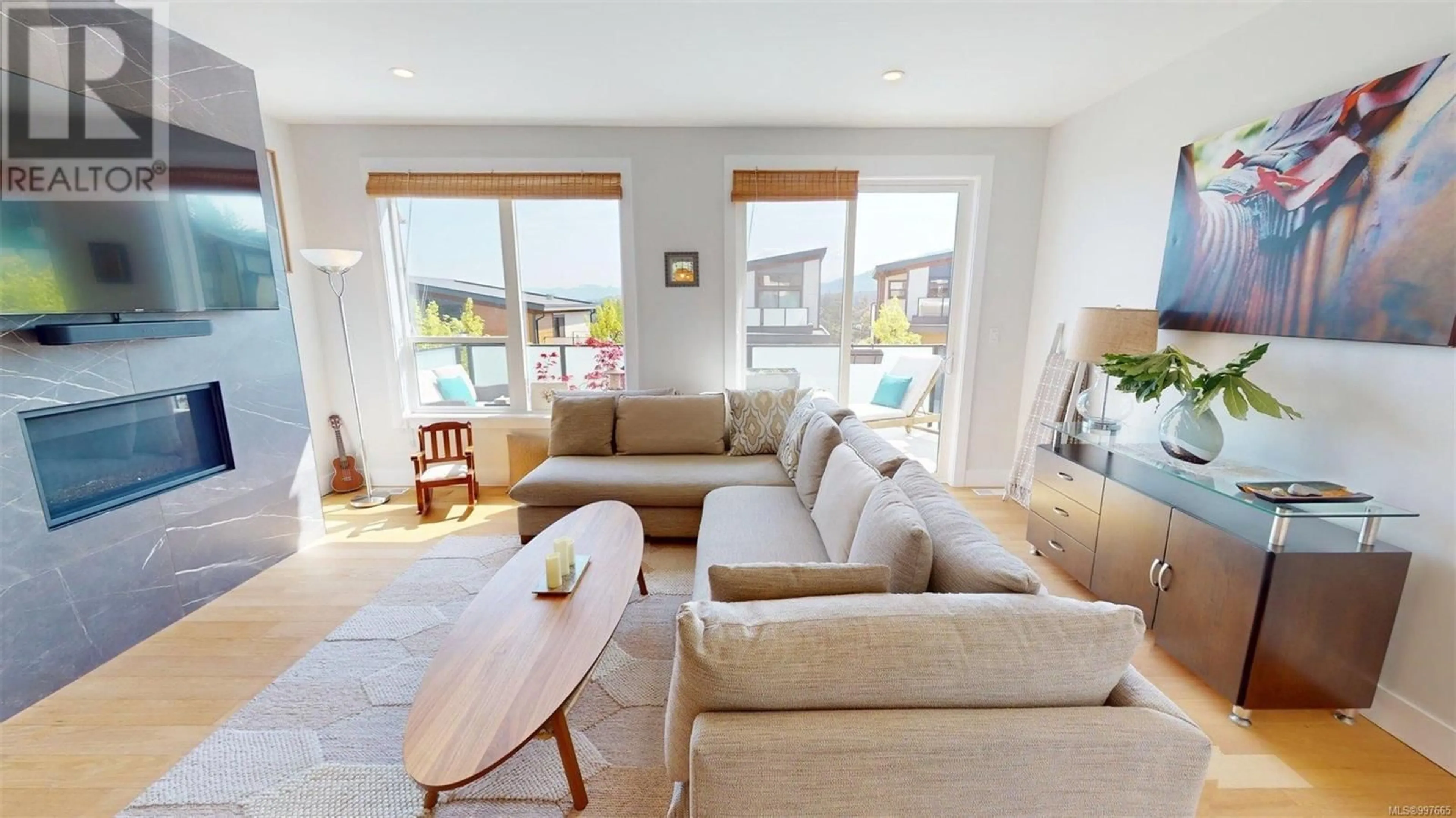 Living room with furniture, wood/laminate floor for 103 - 1217 MANZANITA PLACE, Nanaimo British Columbia V9T0L7