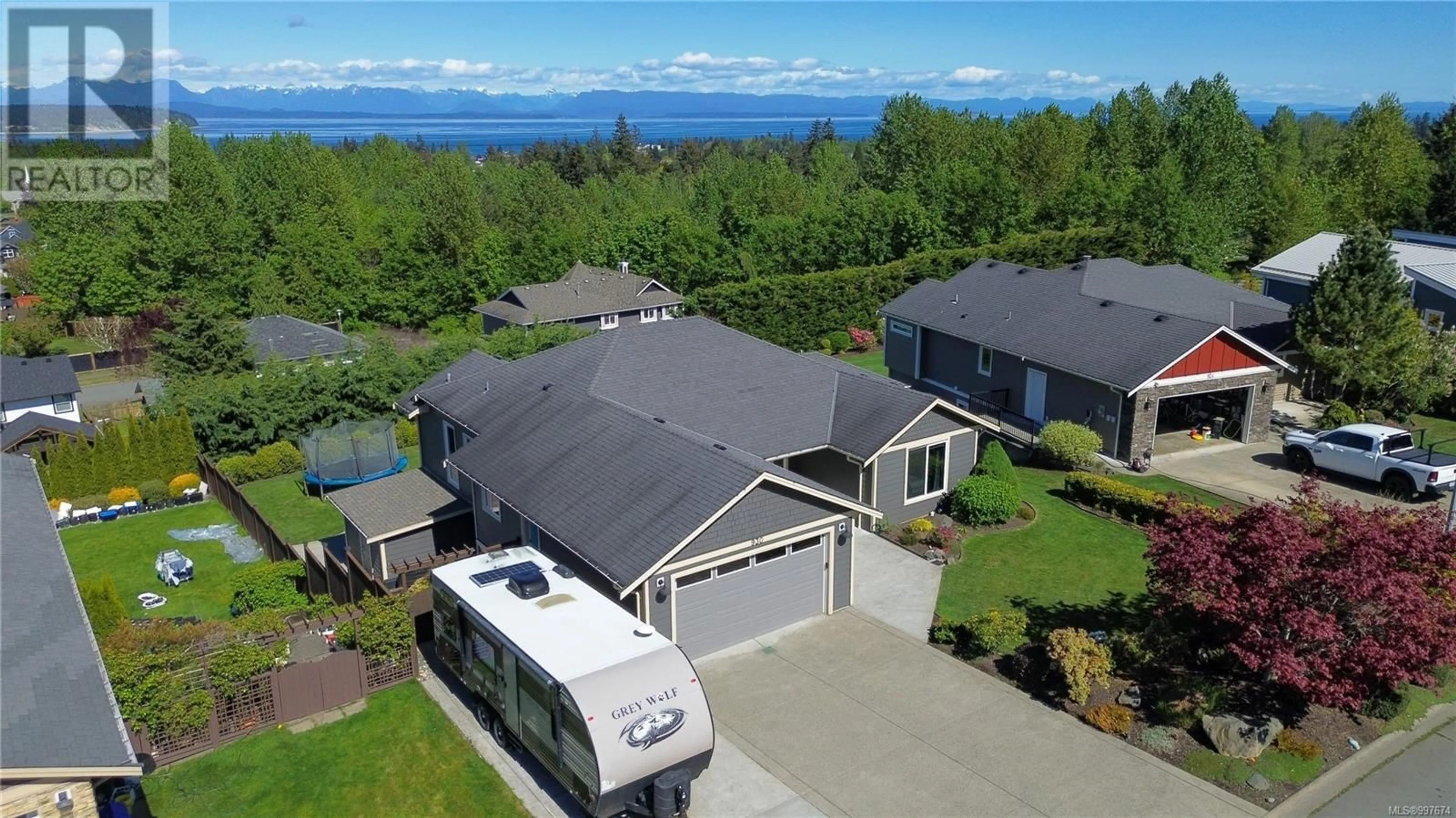 A pic from outside/outdoor area/front of a property/back of a property/a pic from drone, water/lake/river/ocean view for 930 TIMBERLINE DRIVE, Campbell River British Columbia V9H0A8