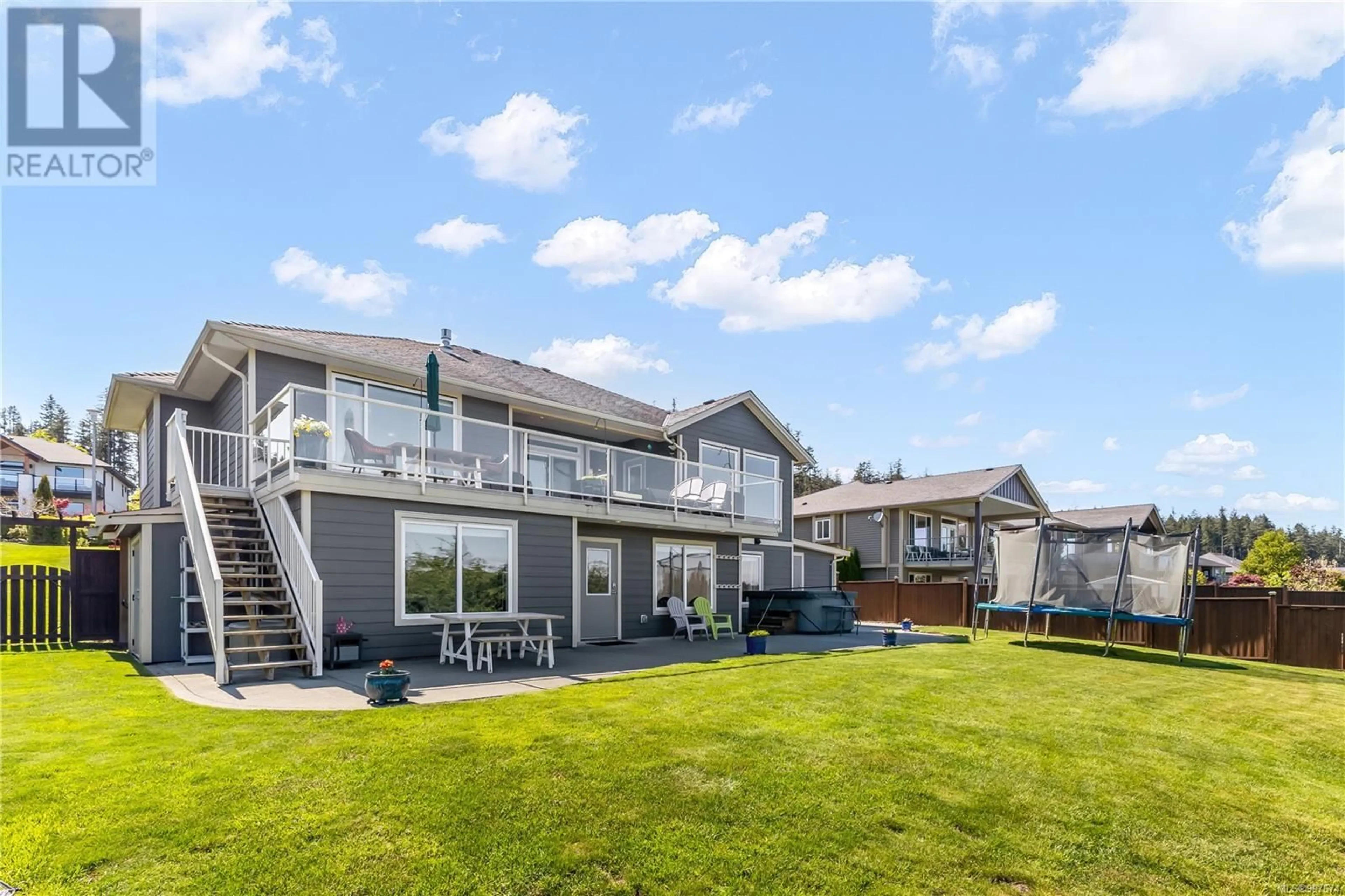 A pic from outside/outdoor area/front of a property/back of a property/a pic from drone, water/lake/river/ocean view for 930 TIMBERLINE DRIVE, Campbell River British Columbia V9H0A8