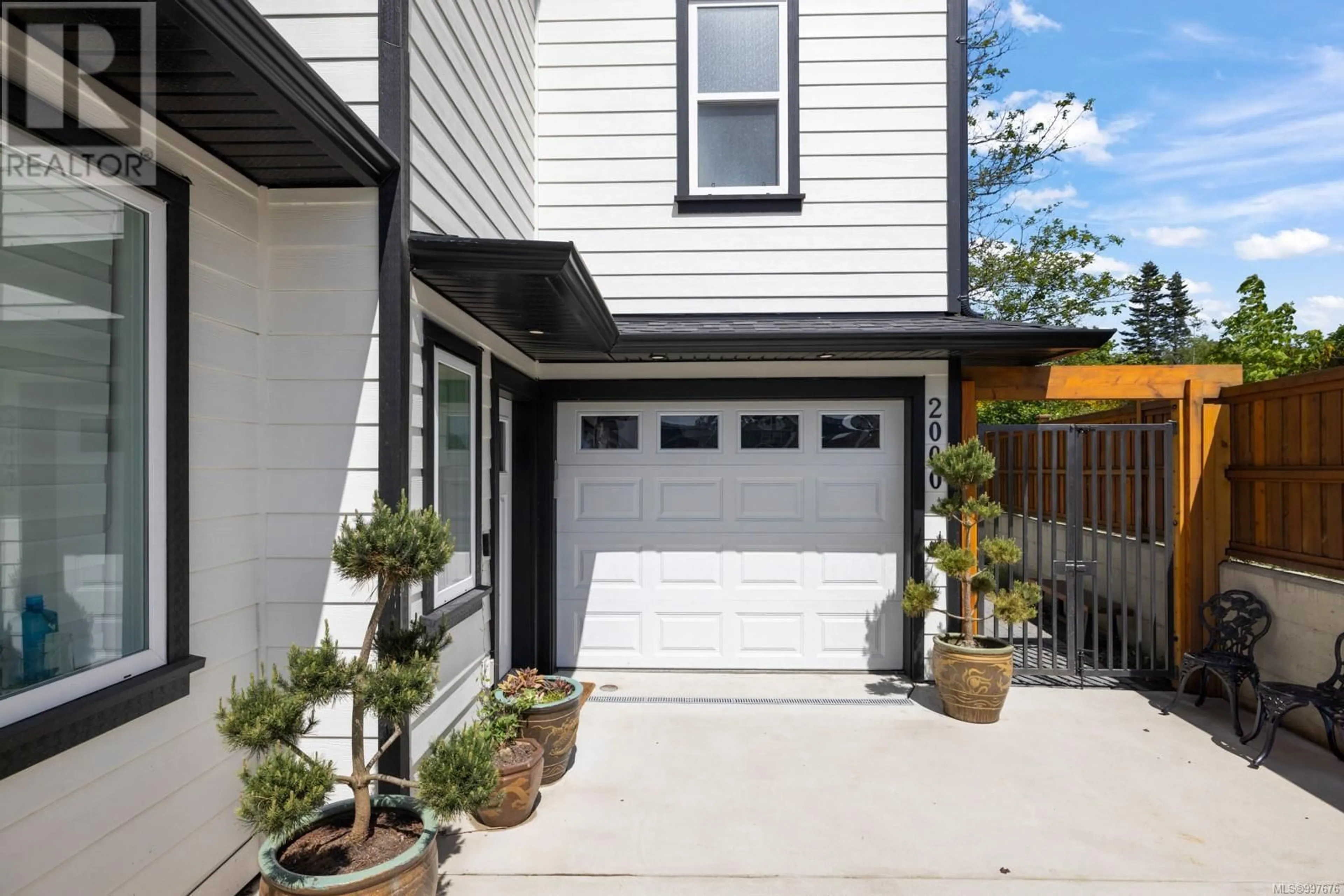 Home with vinyl exterior material, street for 2000 STONE HEARTH LANE, Sooke British Columbia V9Z1L3