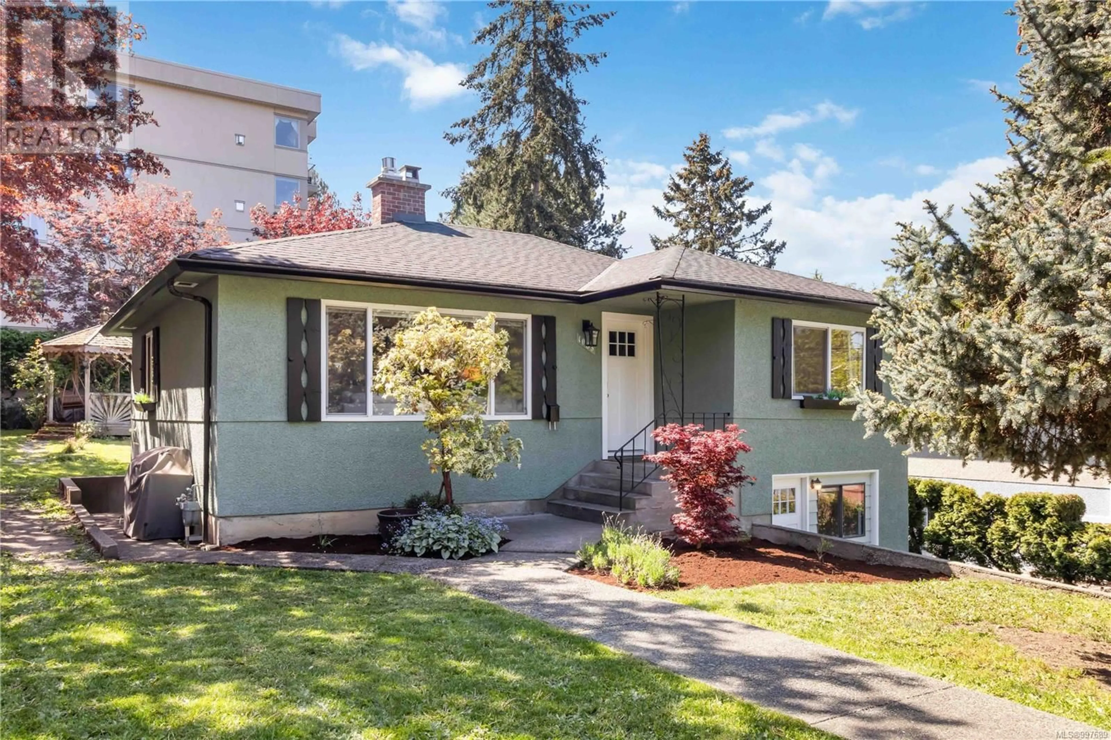 Home with vinyl exterior material, street for 1083 LODGE AVENUE, Saanich British Columbia V8X2B2