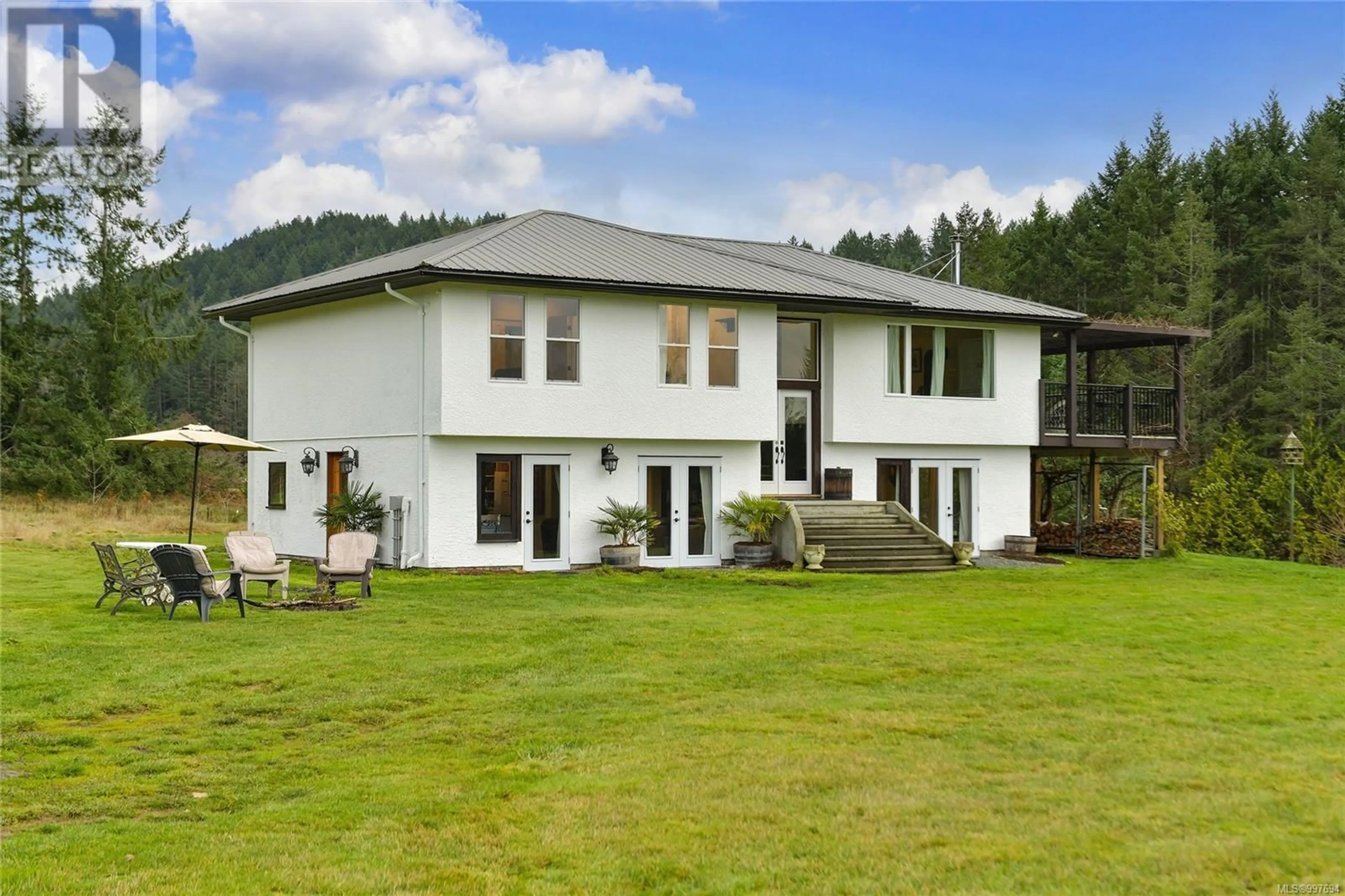 A pic from outside/outdoor area/front of a property/back of a property/a pic from drone, building for 300 WOOD DALE DRIVE, Mayne Island British Columbia V0N2J2