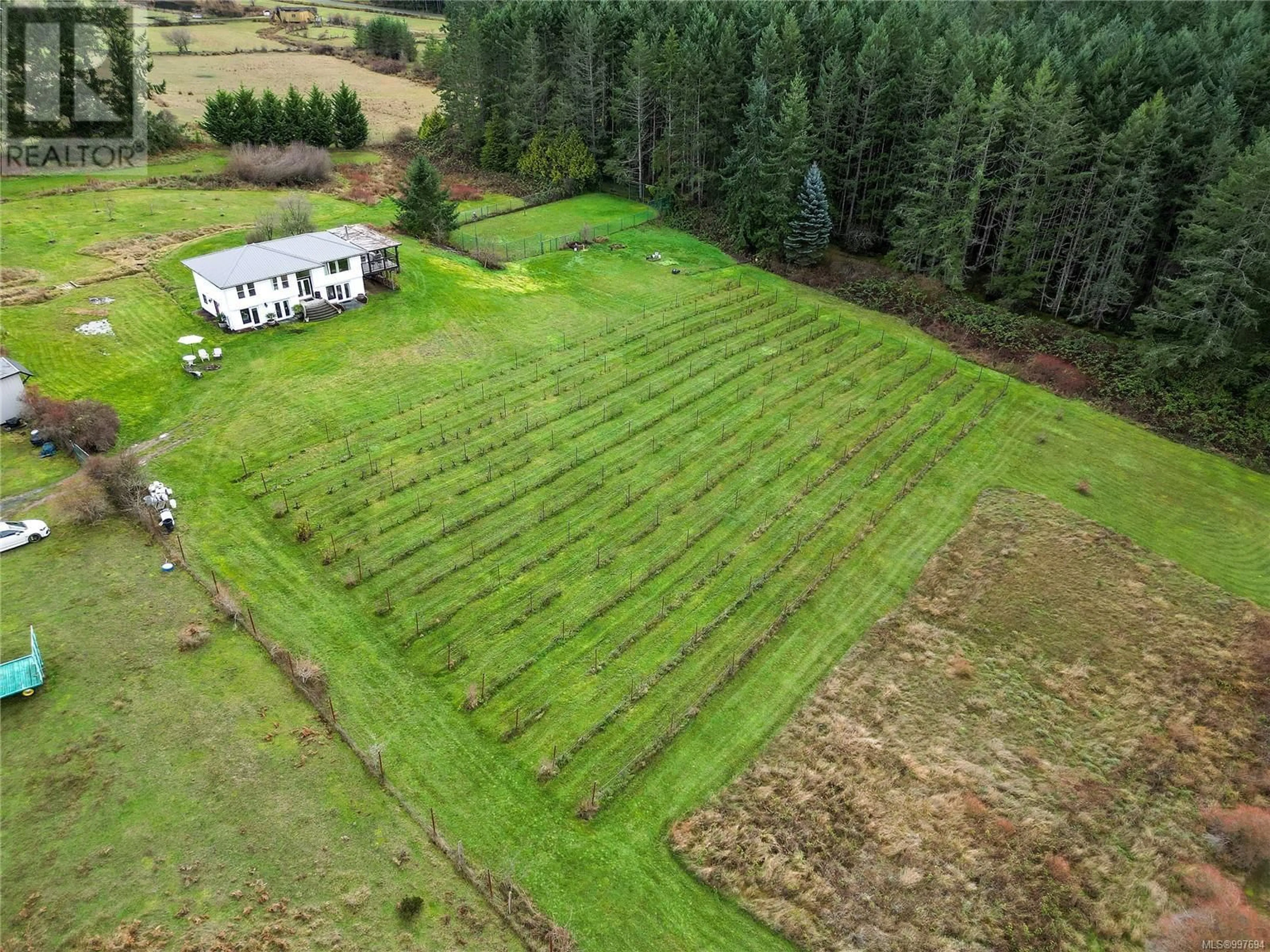 A pic from outside/outdoor area/front of a property/back of a property/a pic from drone, forest/trees view for 300 WOOD DALE DRIVE, Mayne Island British Columbia V0N2J2