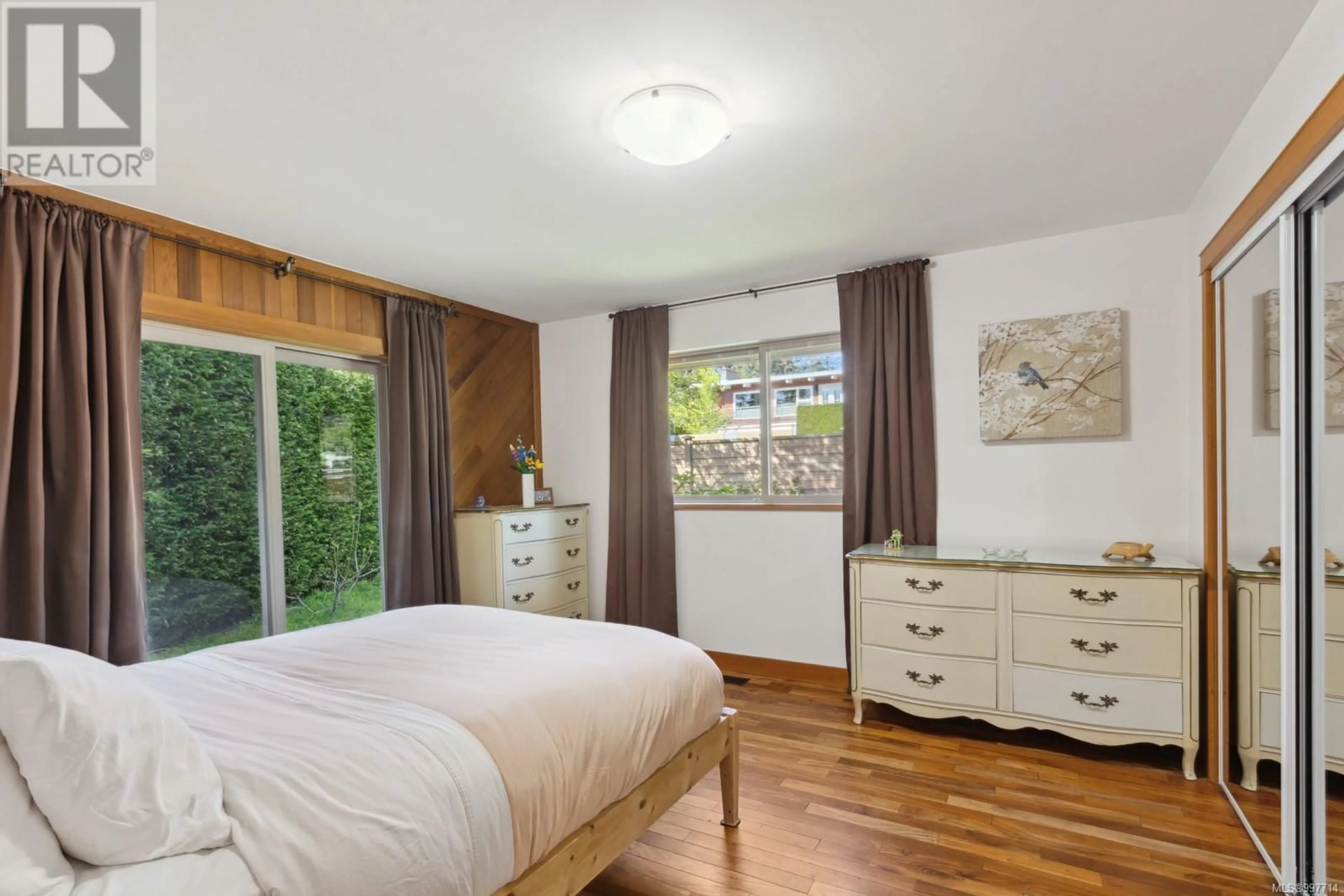 Bedroom with bed, wood/laminate floor for 1639 CENTENNIAL AVENUE EAST, Comox British Columbia V9M2V8