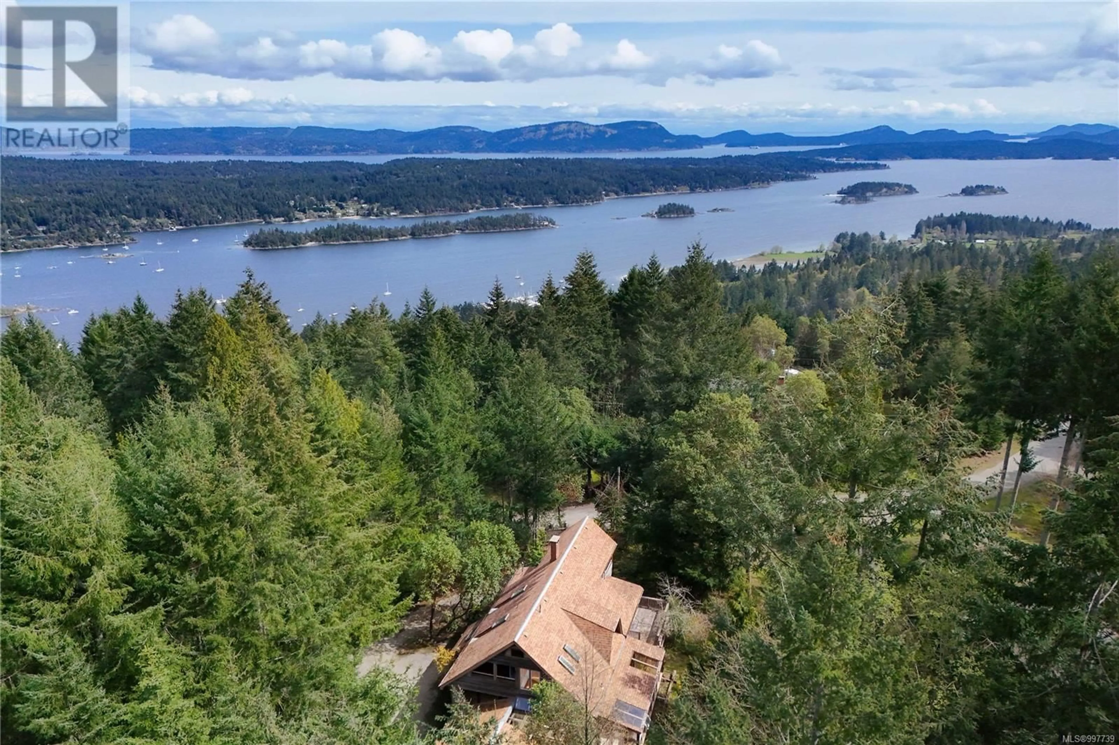 A pic from outside/outdoor area/front of a property/back of a property/a pic from drone, water/lake/river/ocean view for 121 CARLIN AVENUE, Salt Spring British Columbia L1L1L1