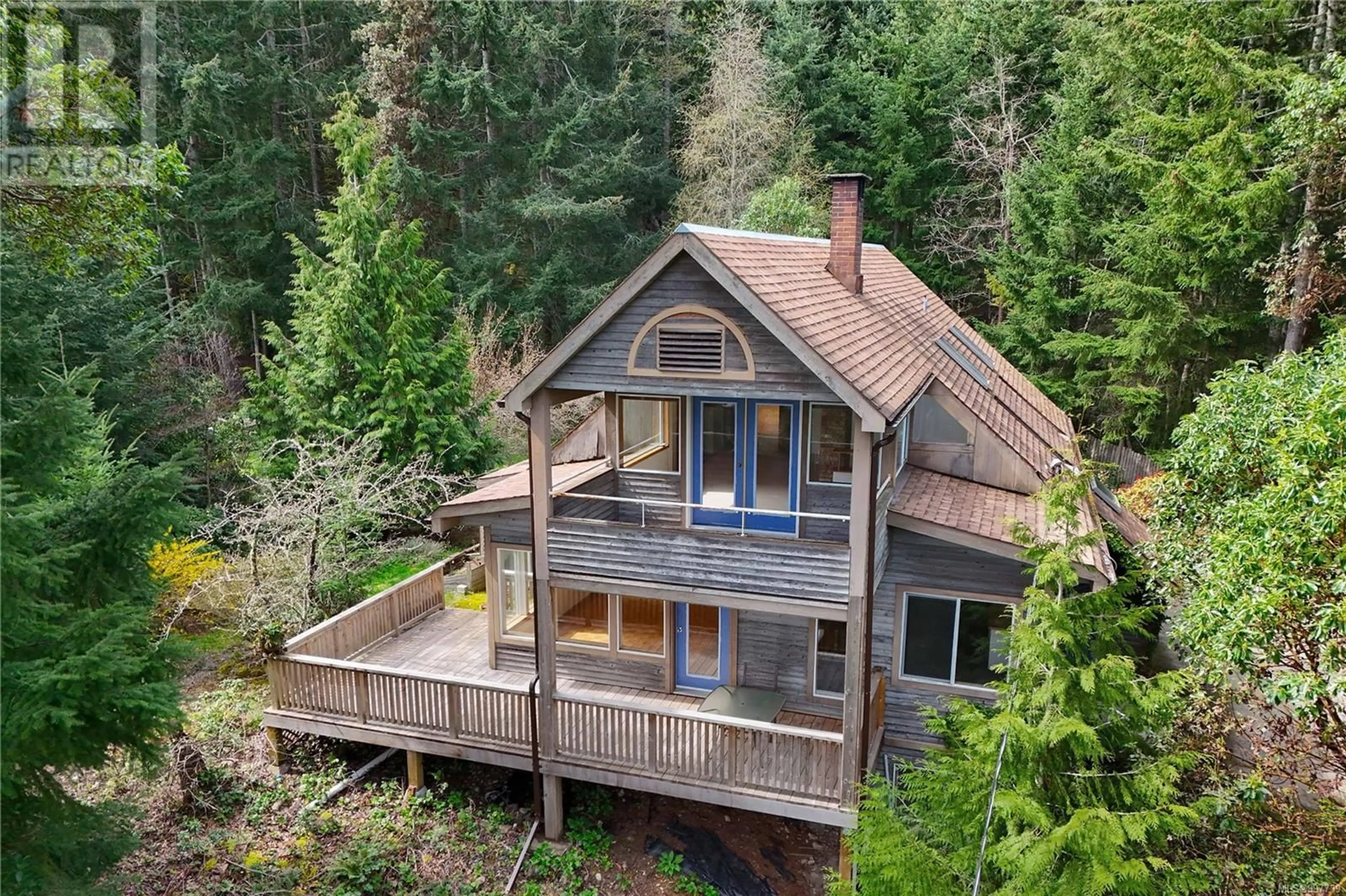 A pic from outside/outdoor area/front of a property/back of a property/a pic from drone, forest/trees view for 121 CARLIN AVENUE, Salt Spring British Columbia L1L1L1