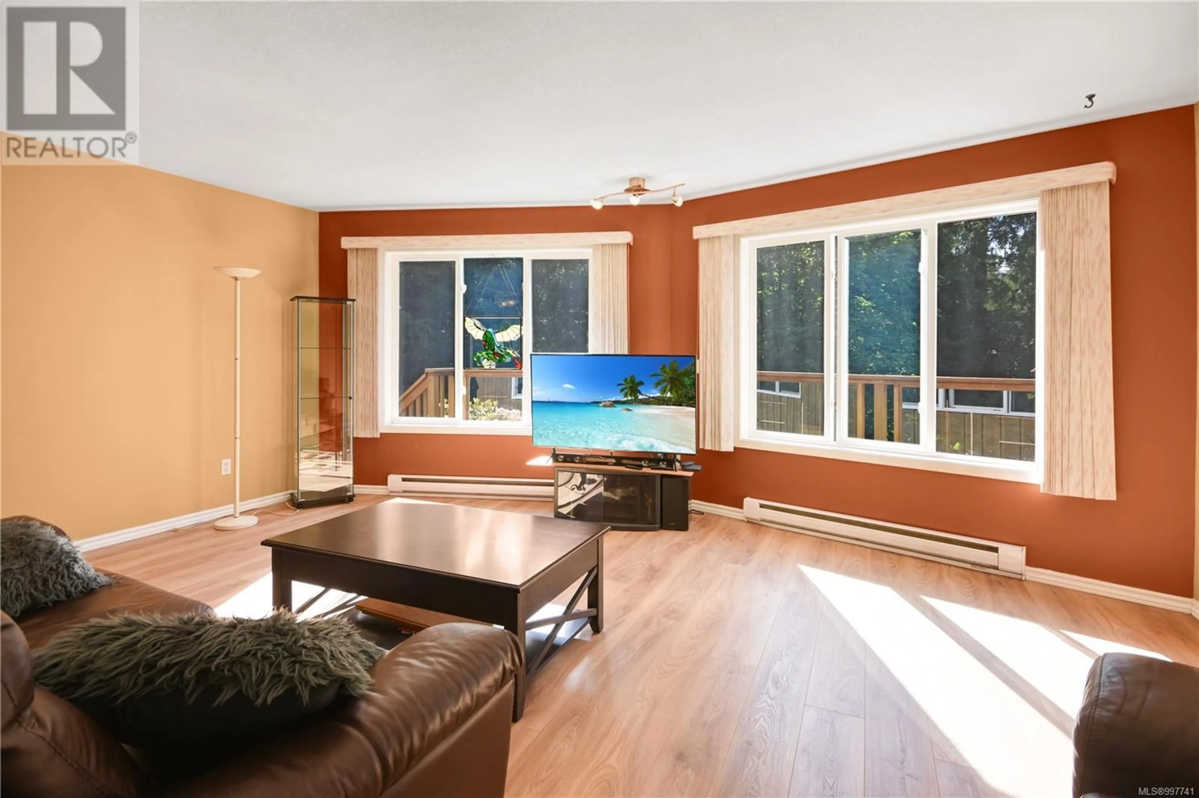 Living room with furniture, wood/laminate floor for 160 ROSISLOS BOULEVARD, Gabriola Island British Columbia V0R1X1