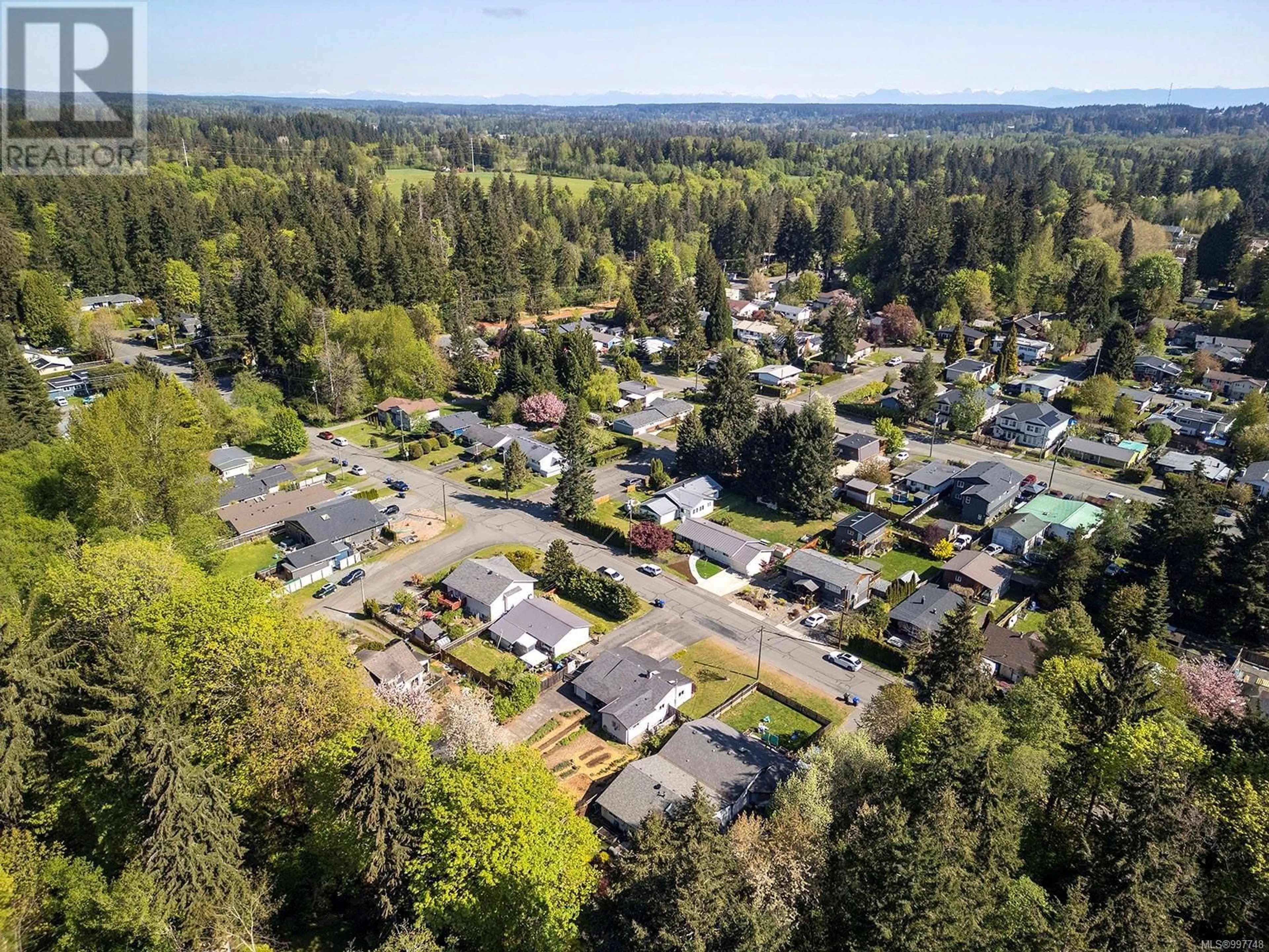 A pic from outside/outdoor area/front of a property/back of a property/a pic from drone, forest/trees view for 365 WILLEMAR AVENUE, Courtenay British Columbia V9N3L3