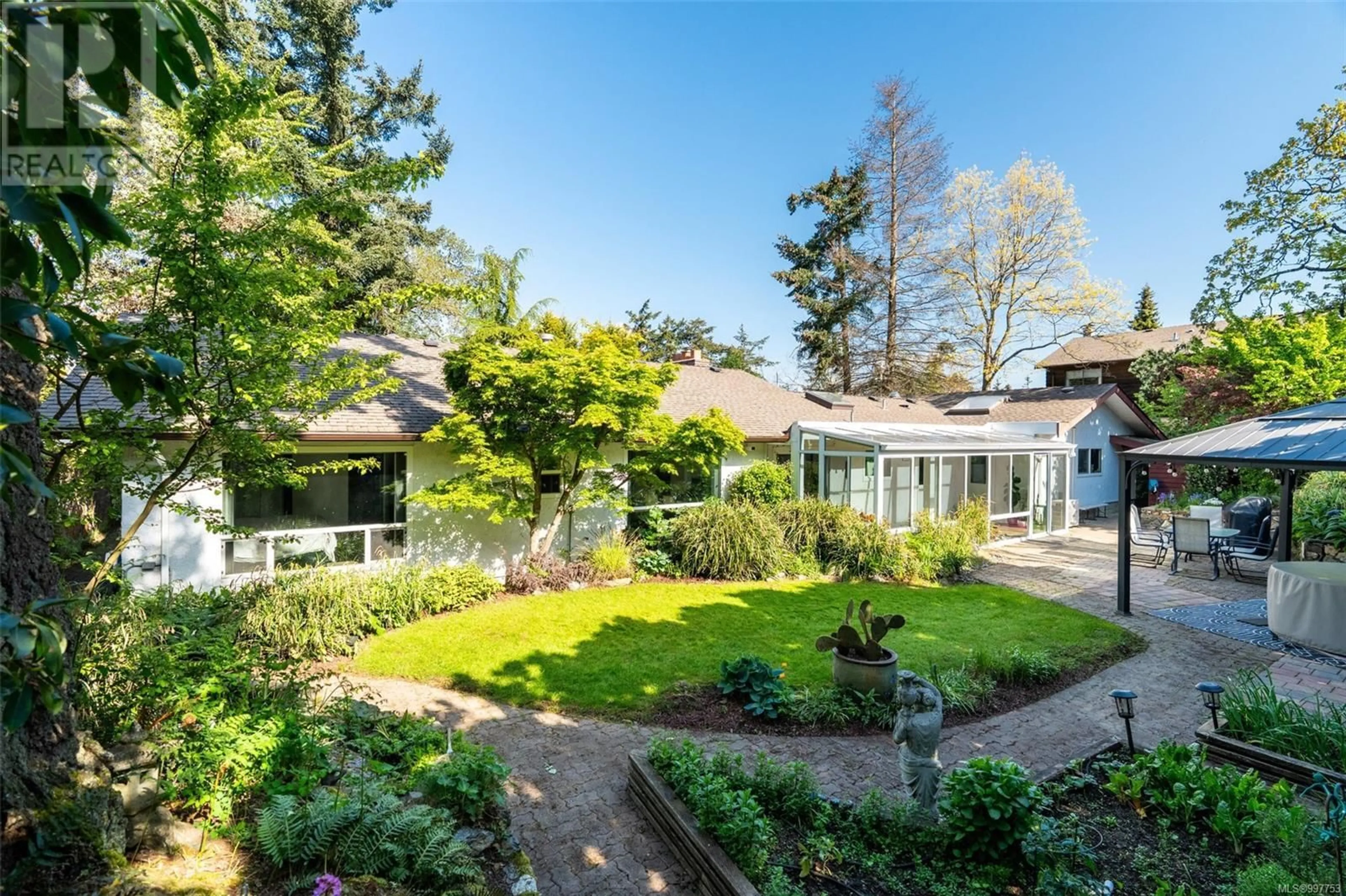 A pic from outside/outdoor area/front of a property/back of a property/a pic from drone, street for 1373 TREEBANK ROAD WEST, Esquimalt British Columbia V9A6Y7