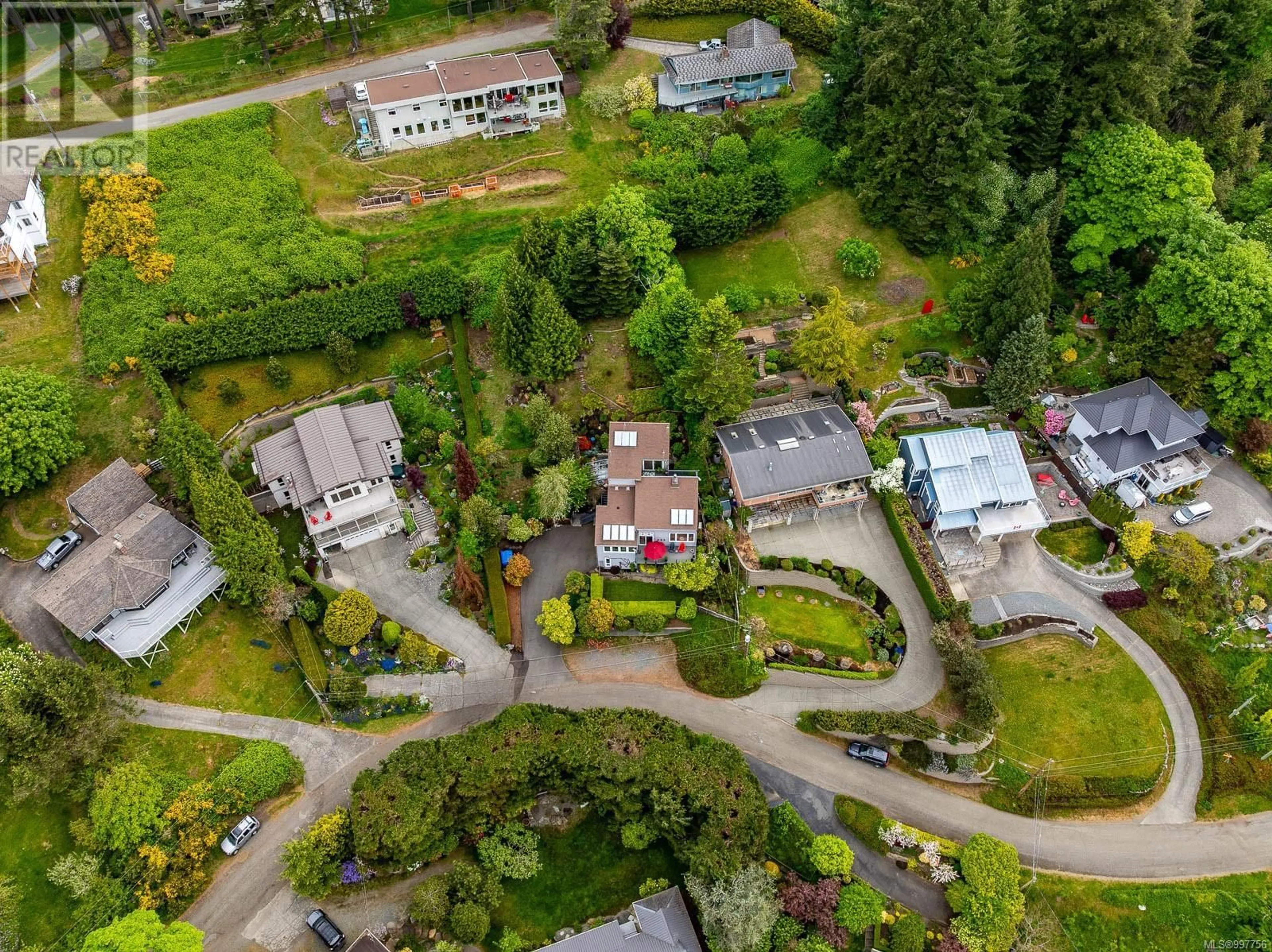 A pic from outside/outdoor area/front of a property/back of a property/a pic from drone, street for 1166 YATES ROAD, Comox British Columbia V9M3X3