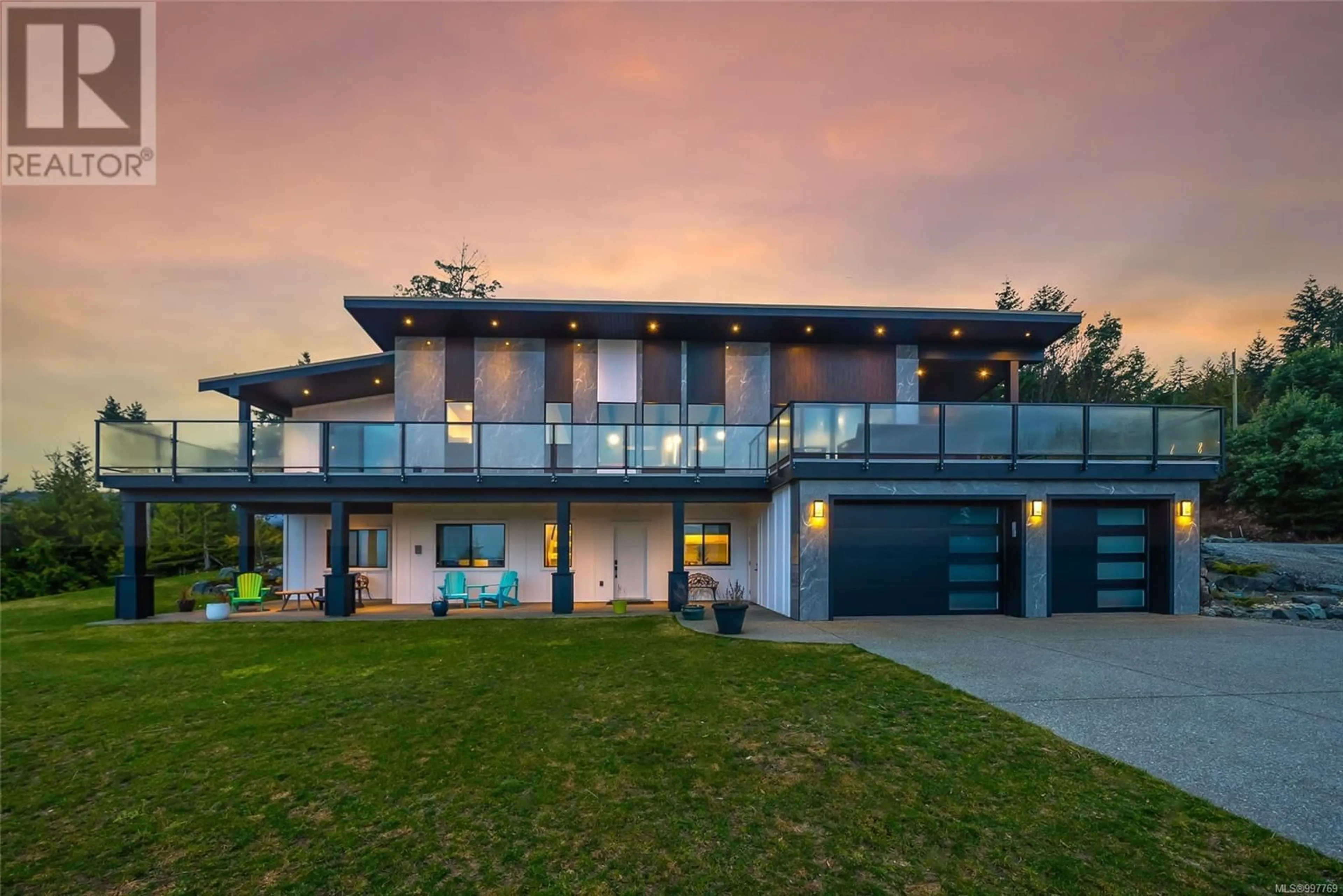 Home with brick exterior material, unknown for 1704 WARN WAY, Qualicum Beach British Columbia V9K2S3