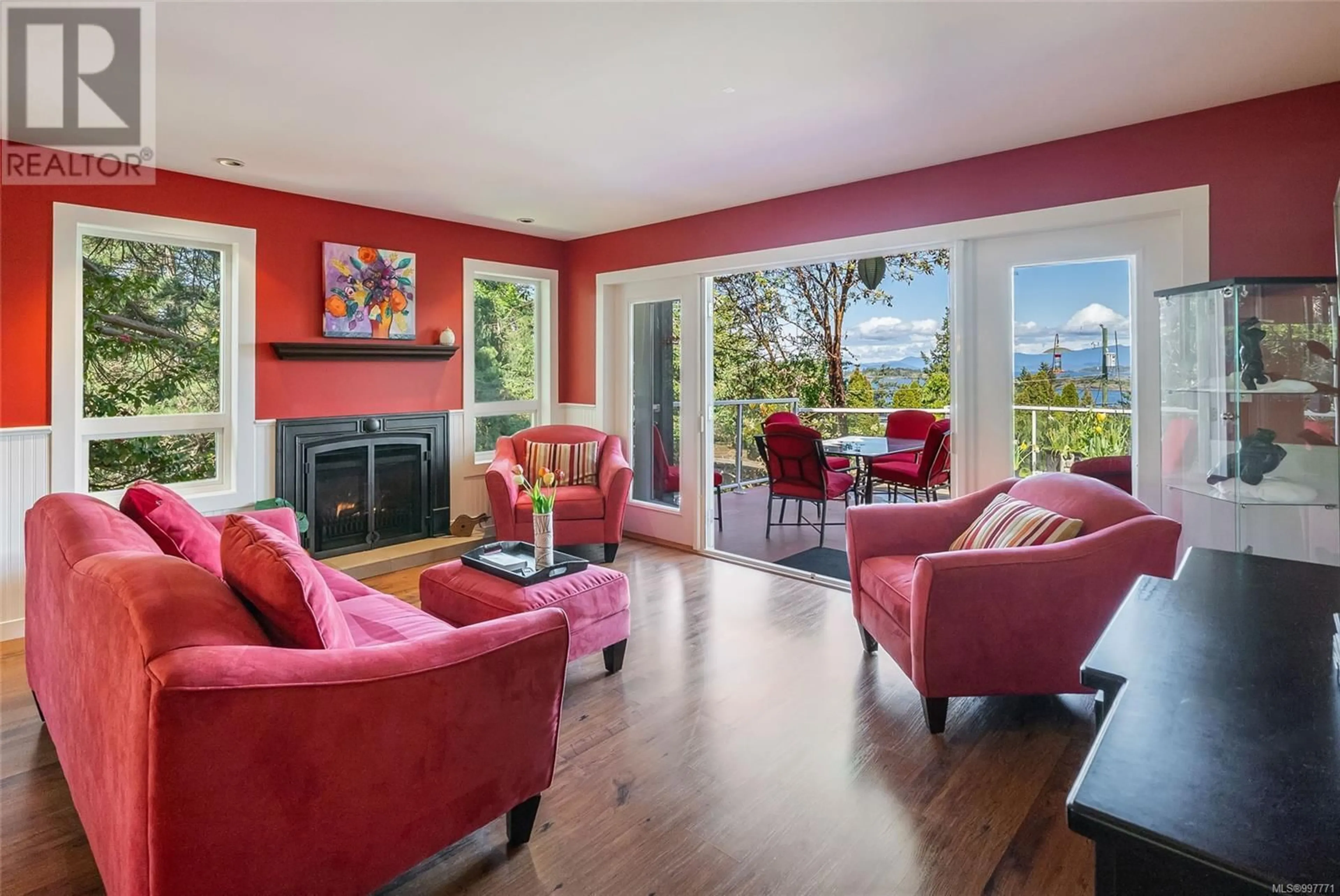 Living room with furniture, wood/laminate floor for 3259 DOLPHIN DRIVE, Nanoose Bay British Columbia V9P9J1