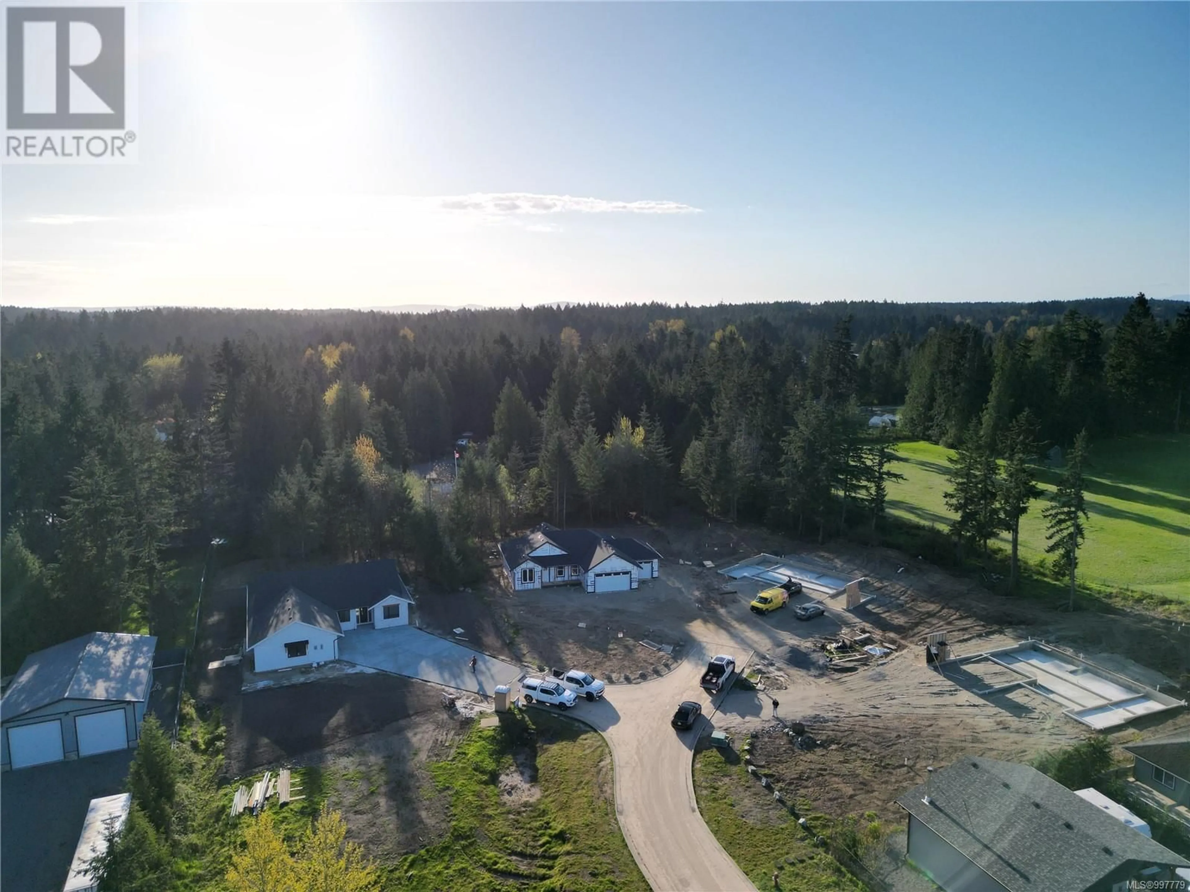 A pic from outside/outdoor area/front of a property/back of a property/a pic from drone, forest/trees view for 1940 WOOBANK ROAD, Nanaimo British Columbia V9X1G9