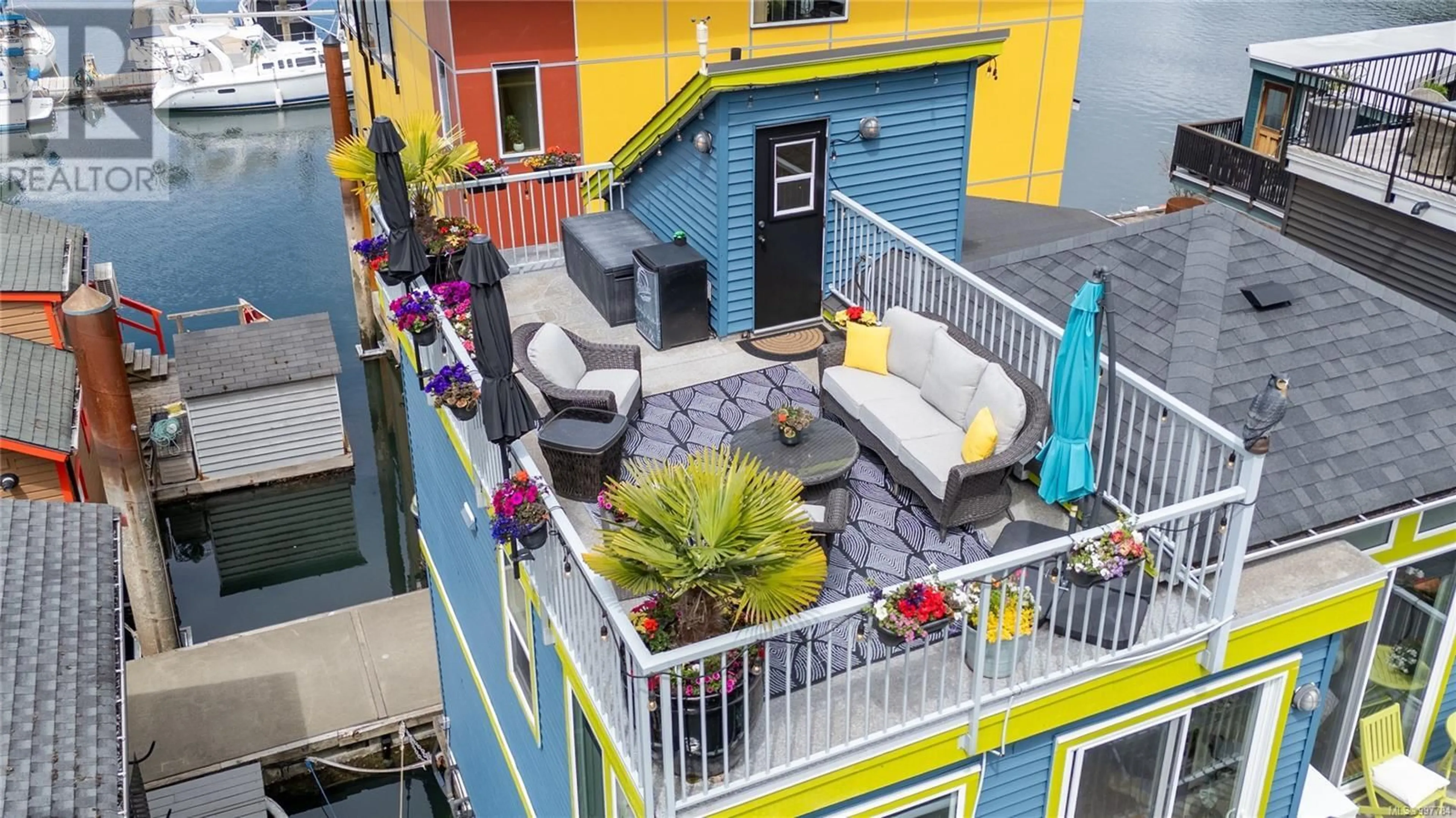 Patio, city buildings view from balcony for J10 - 6145 GENOA BAY ROAD, Duncan British Columbia V9L5T7