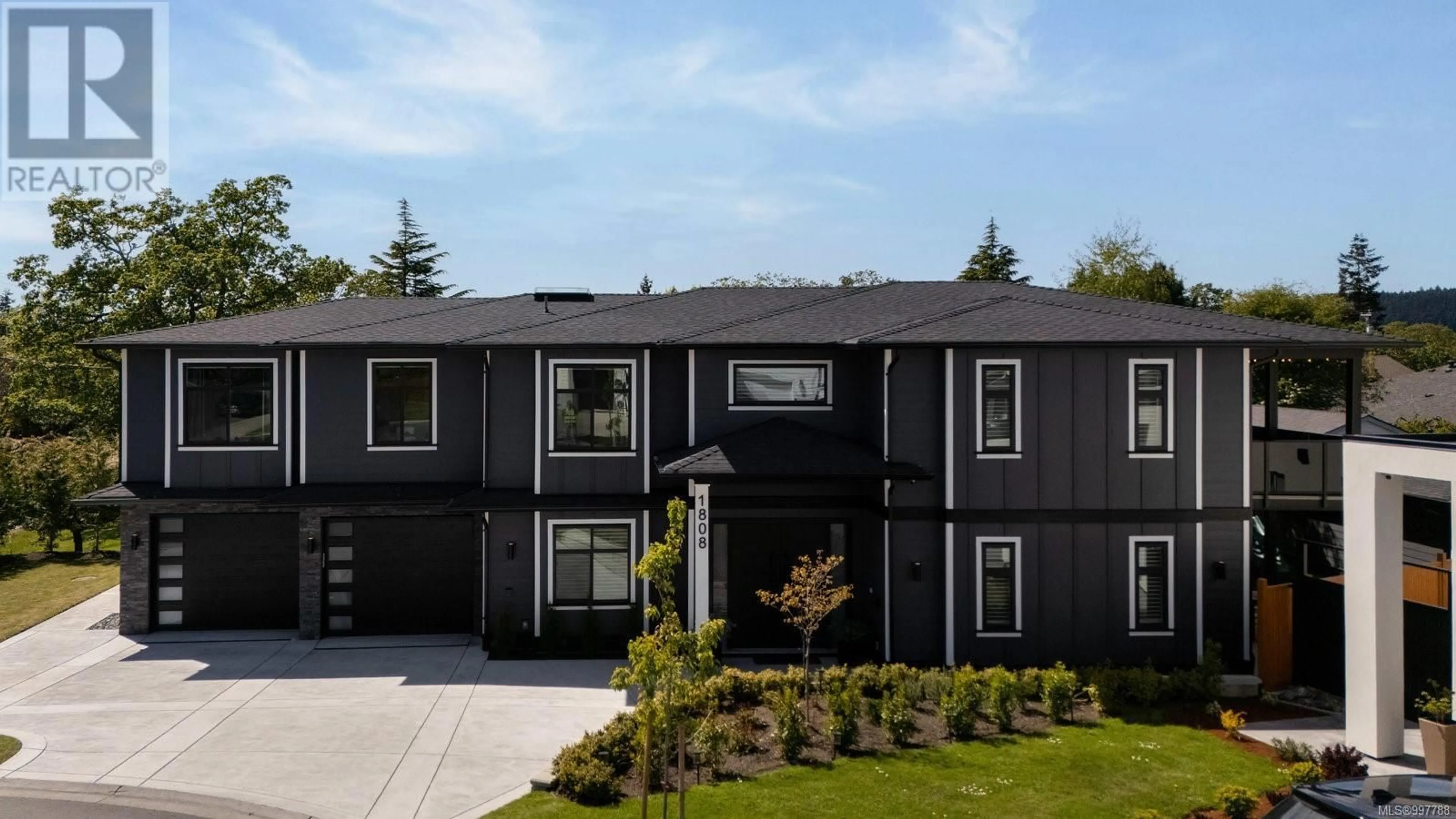 Home with vinyl exterior material, street for 1808 FELTHAM ROAD, Saanich British Columbia V8N2A6