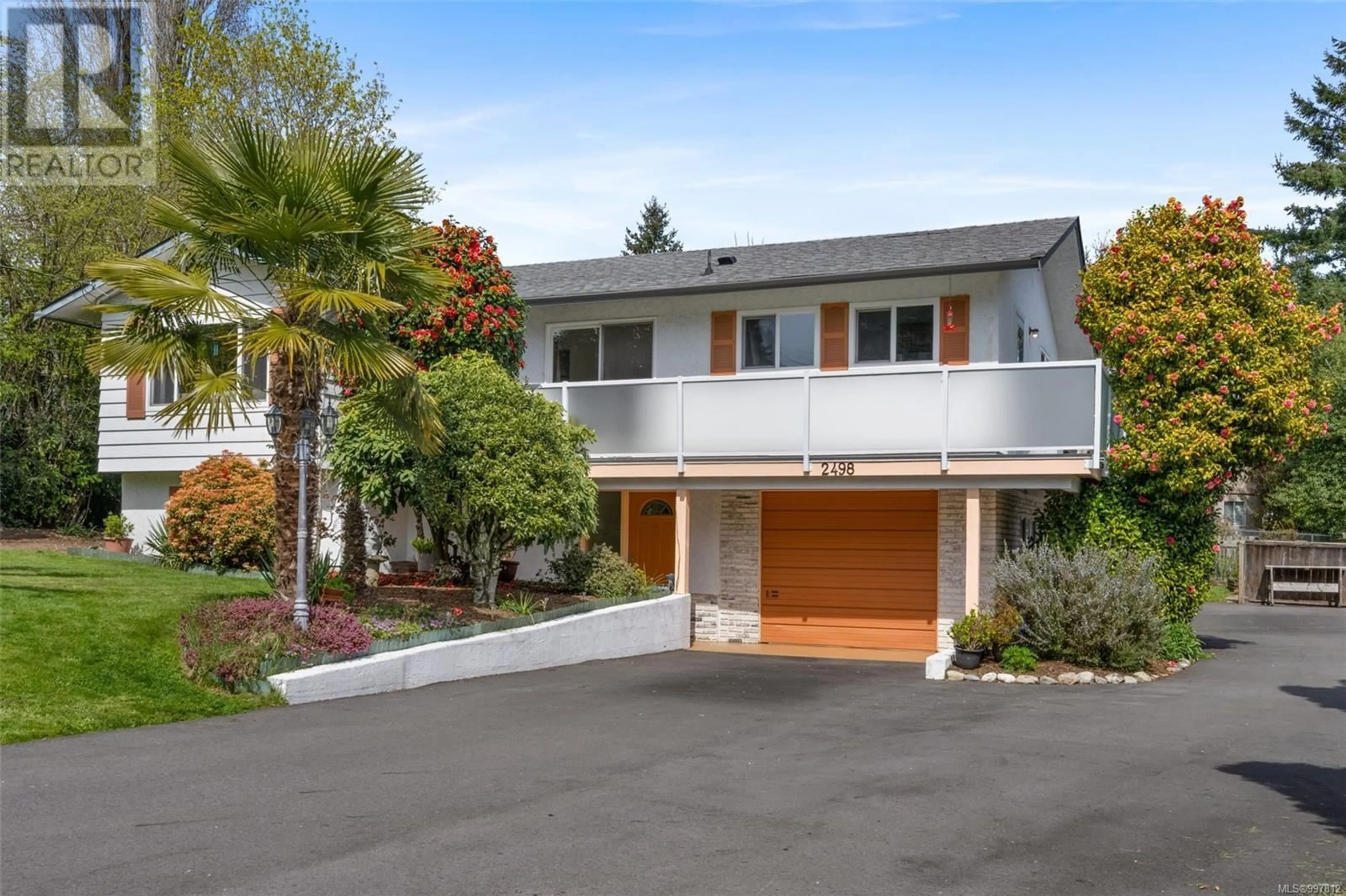 Home with vinyl exterior material, street for 2498 MEADOWLAND DRIVE, Central Saanich British Columbia V8Z5P5