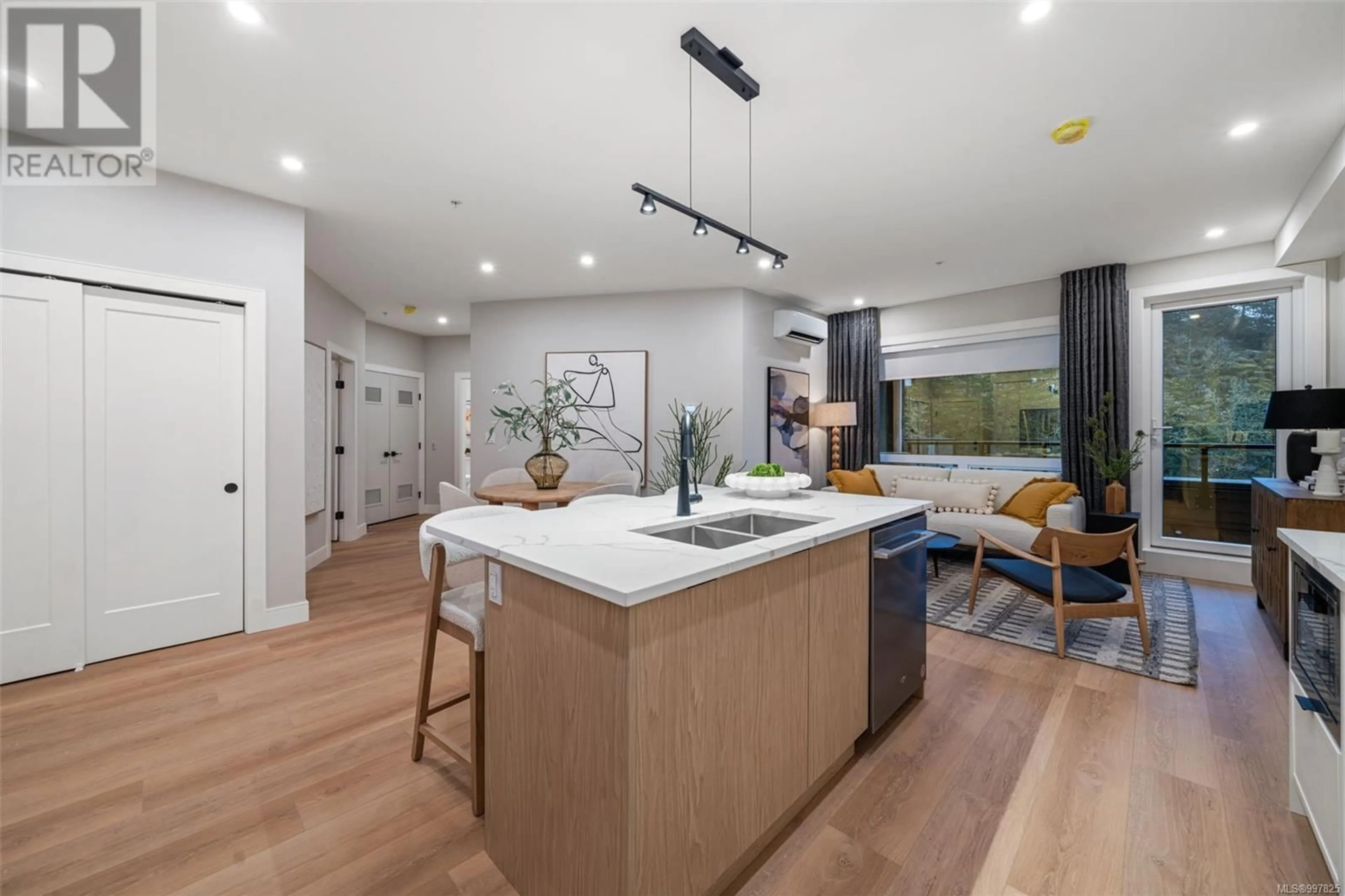 Open concept kitchen, unknown for 605 - 1810 SELENITE PLACE, Langford British Columbia V9B7E2