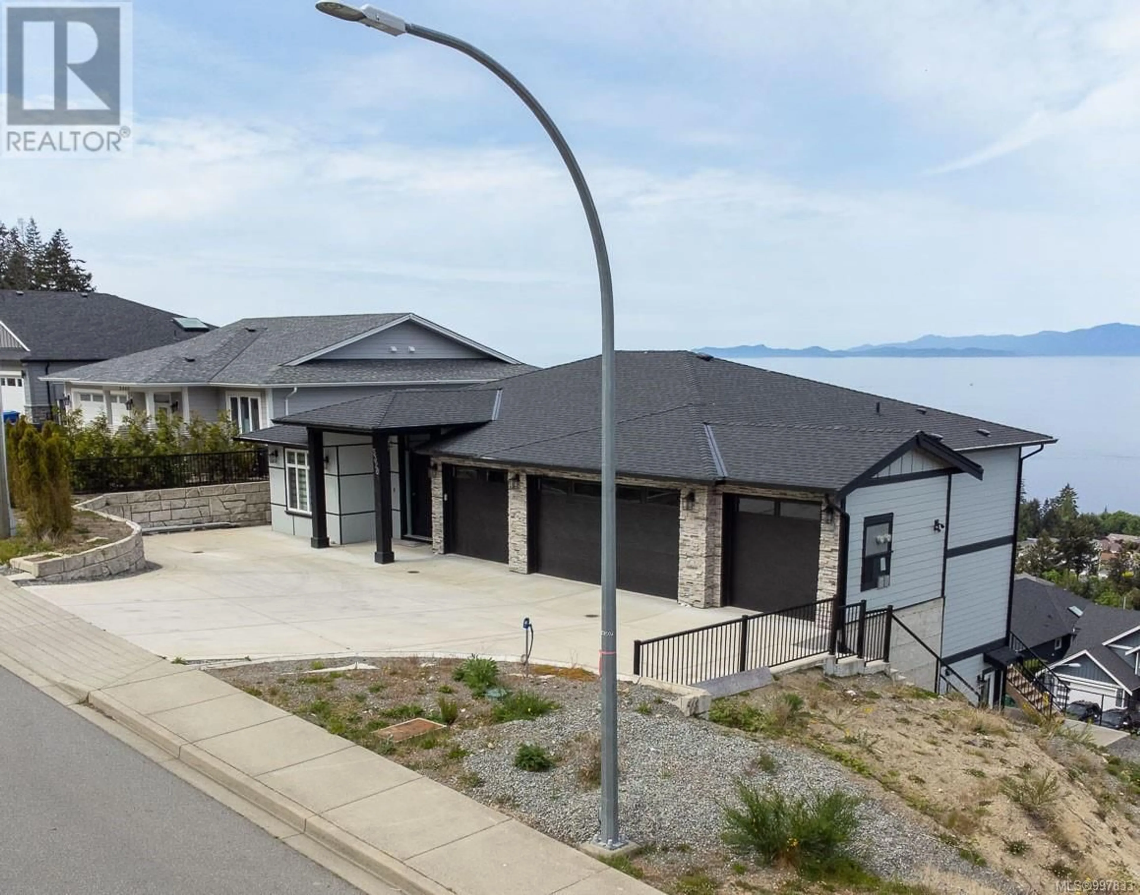 A pic from outside/outdoor area/front of a property/back of a property/a pic from drone, unknown for 5326 DEWAR ROAD, Nanaimo British Columbia V9S3G3