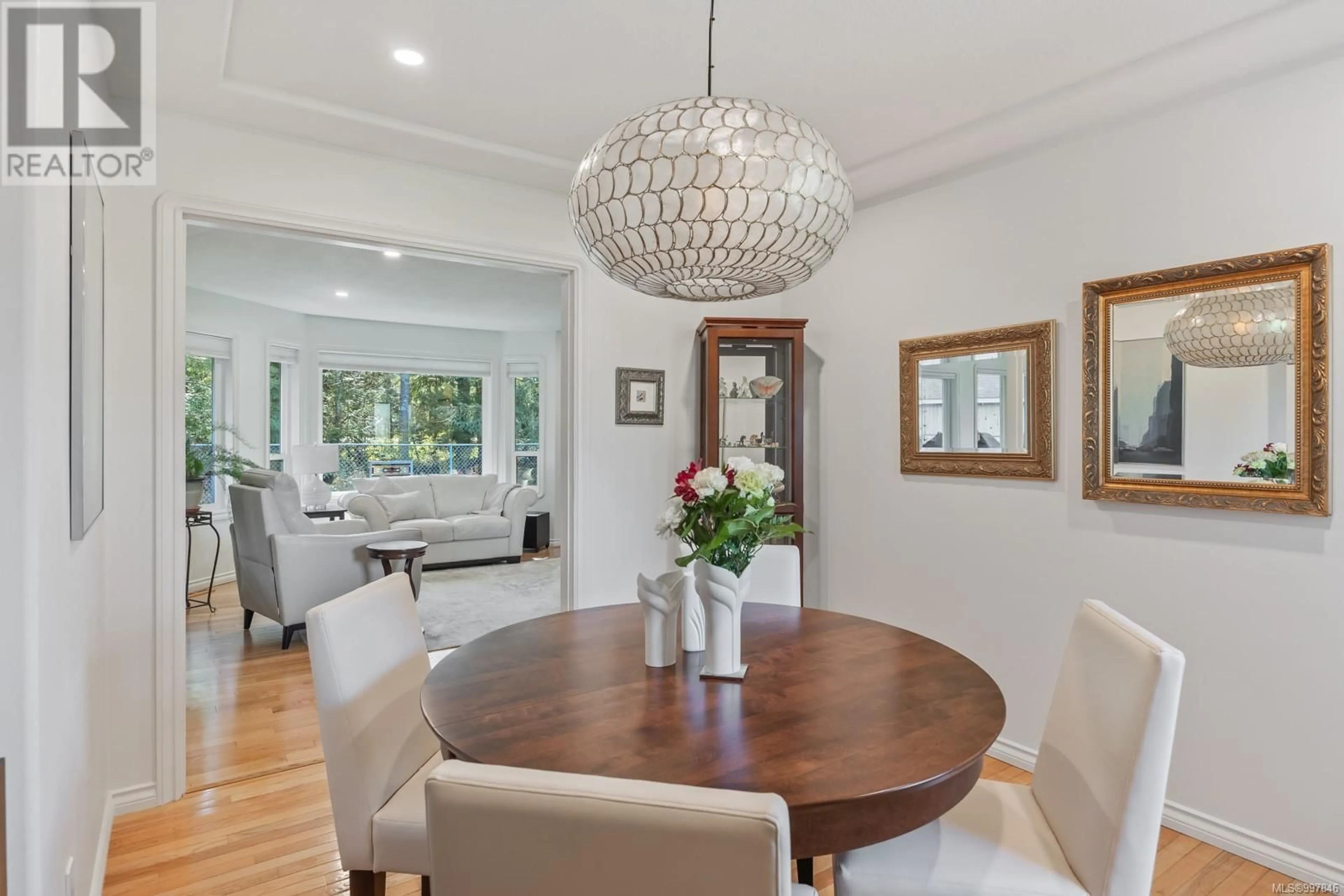Dining room, wood/laminate floor for 717 REDWOOD DRIVE, Qualicum Beach British Columbia V9K2J2