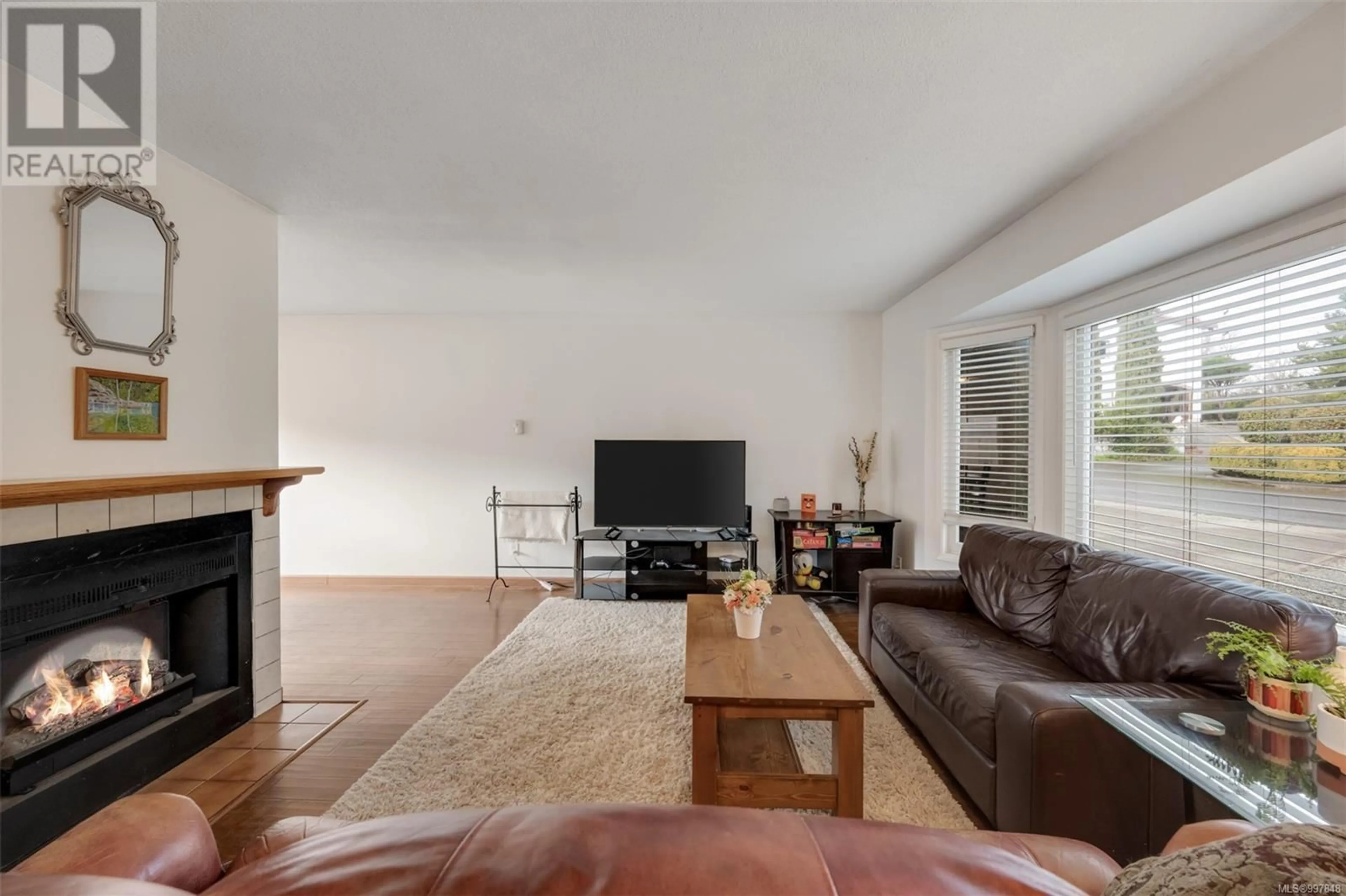 Living room with furniture, unknown for 1235 ASTRA PLACE, Saanich British Columbia V8P5N5