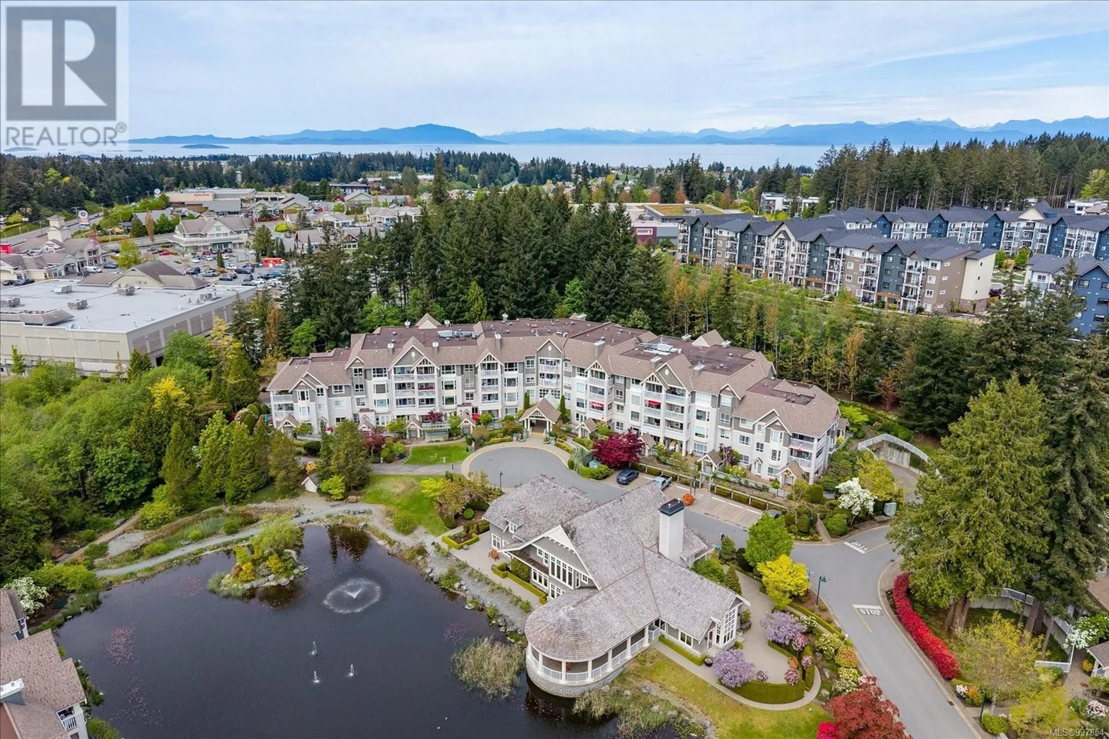 A pic from outside/outdoor area/front of a property/back of a property/a pic from drone, water/lake/river/ocean view for 404 - 5620 EDGEWATER LANE, Nanaimo British Columbia V9T6K1