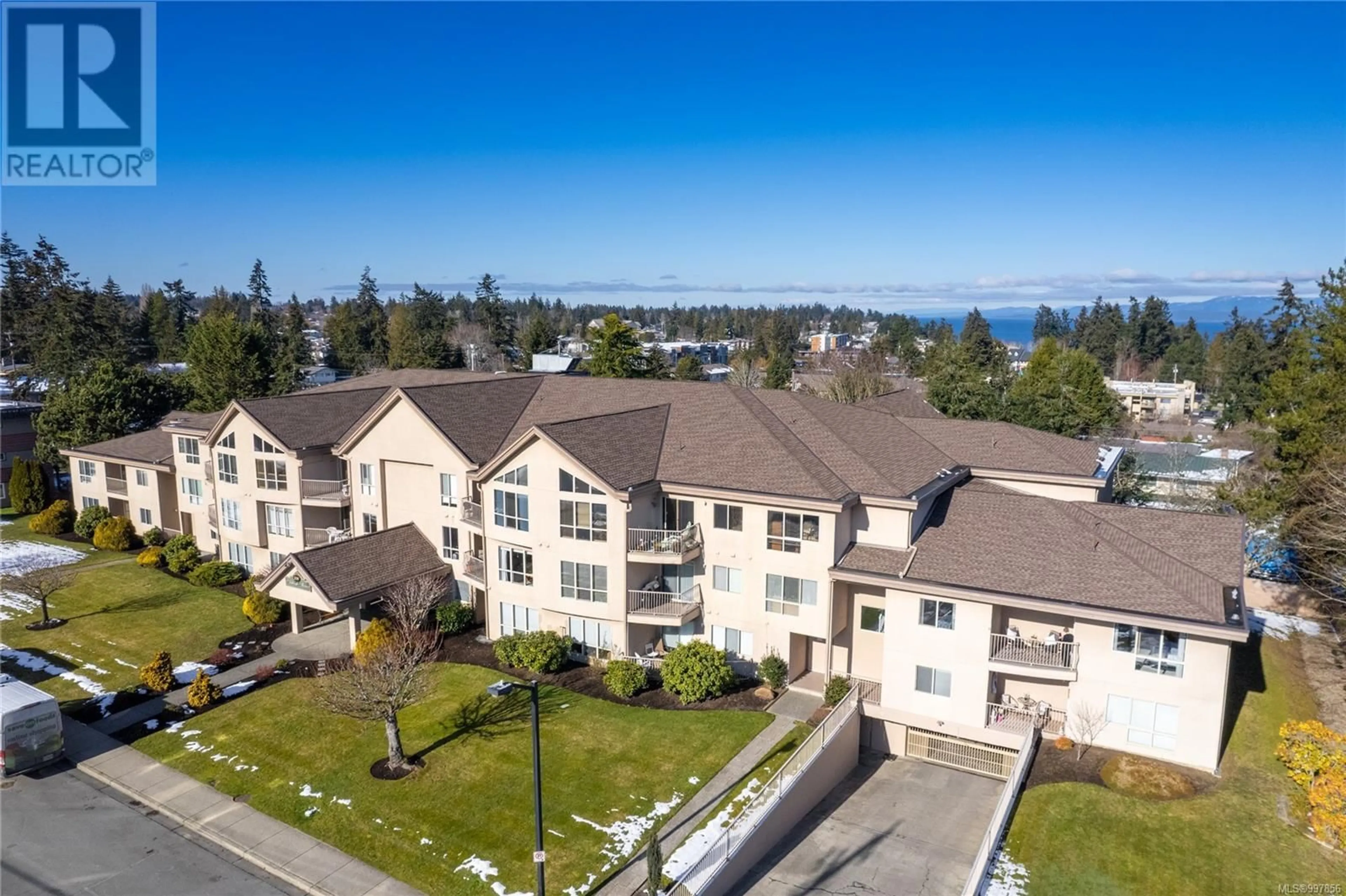 A pic from outside/outdoor area/front of a property/back of a property/a pic from drone, water/lake/river/ocean view for 209 - 335 HIRST AVENUE WEST, Parksville British Columbia V9P2R5