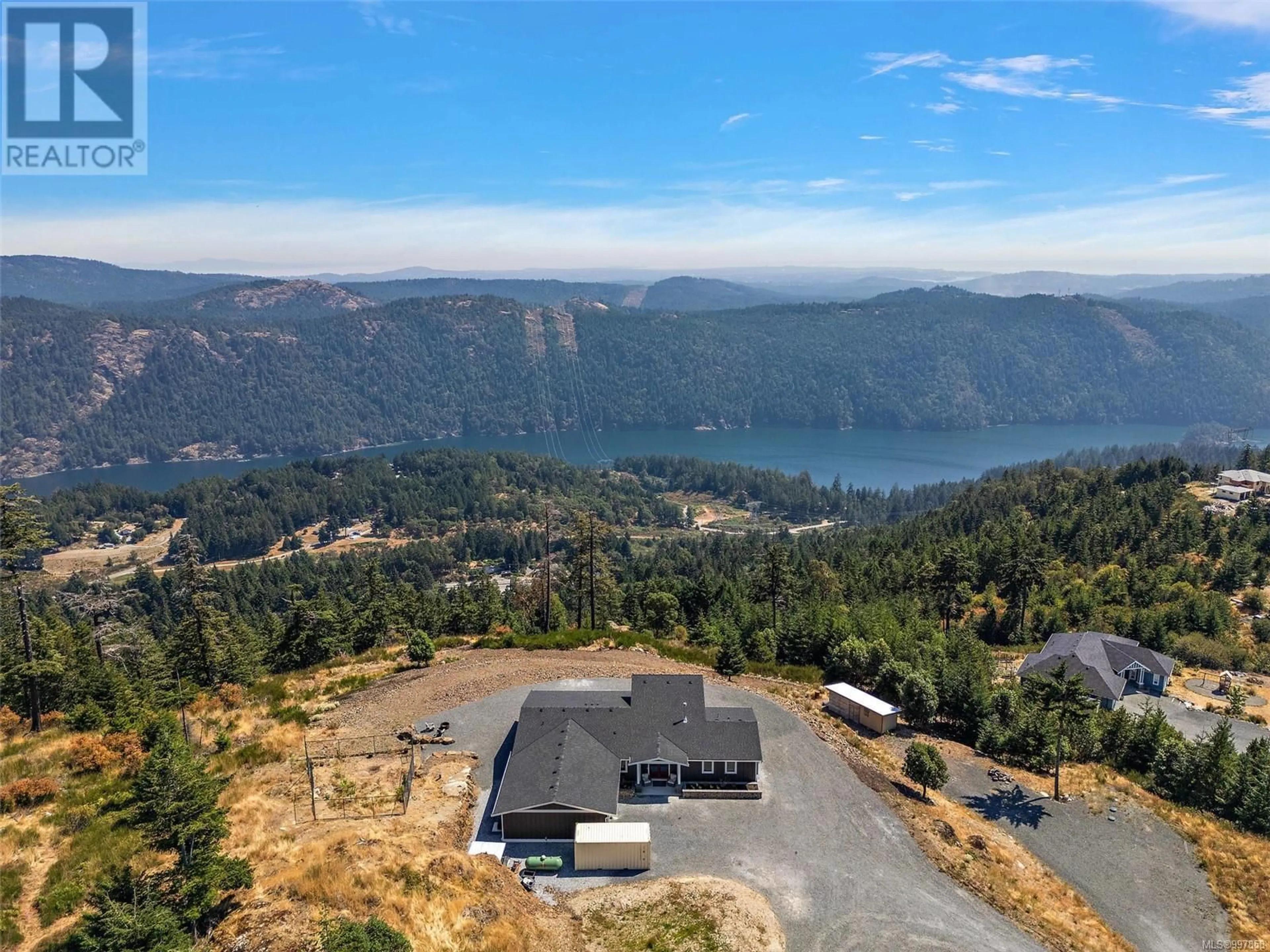 A pic from outside/outdoor area/front of a property/back of a property/a pic from drone, mountain view for 4030 RIDGELINE DRIVE, Malahat British Columbia V0R2W3