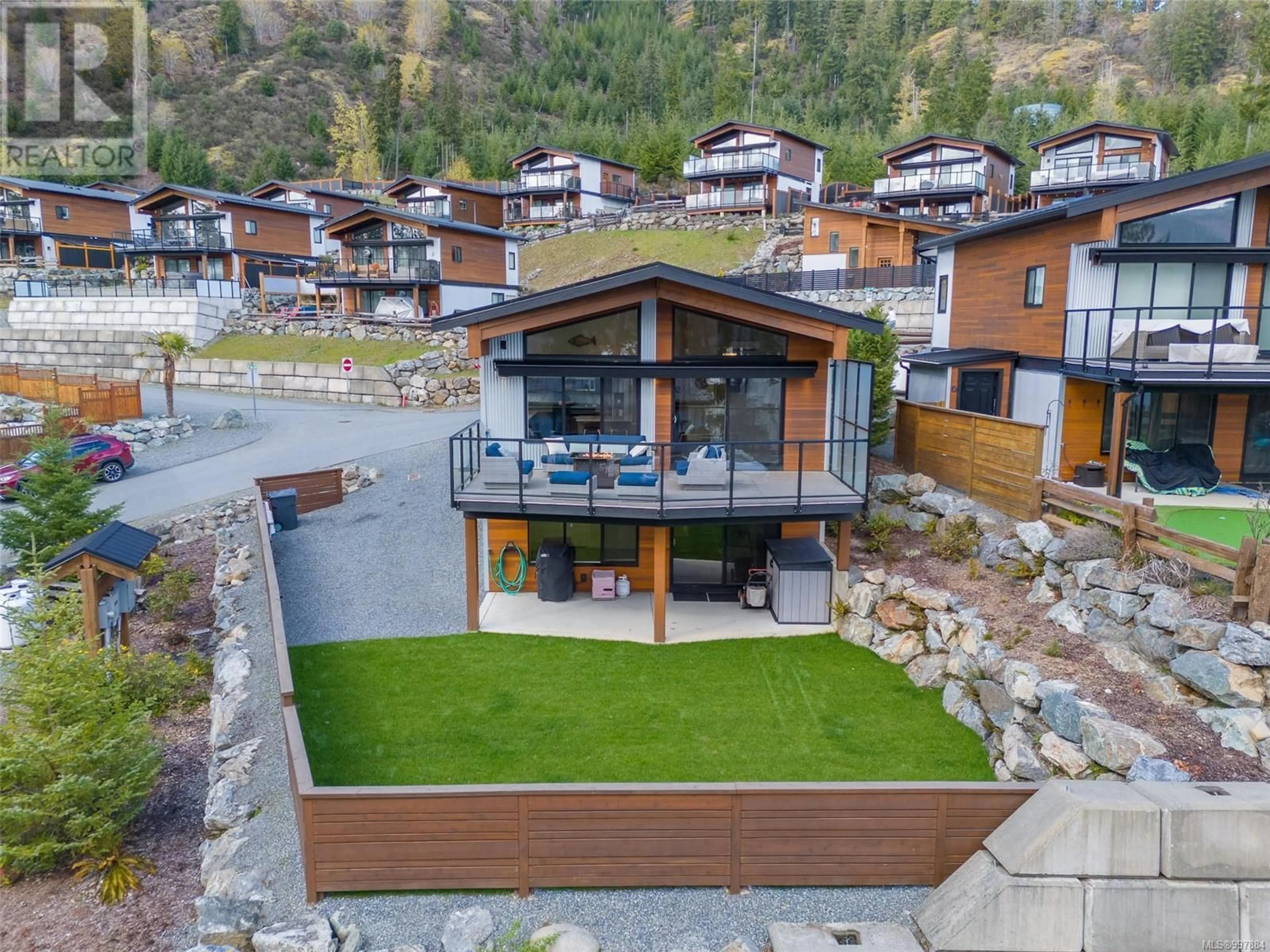 A pic from outside/outdoor area/front of a property/back of a property/a pic from drone, mountain view for 7420 COTTAGE WAY, Lake Cowichan British Columbia V0R2G1