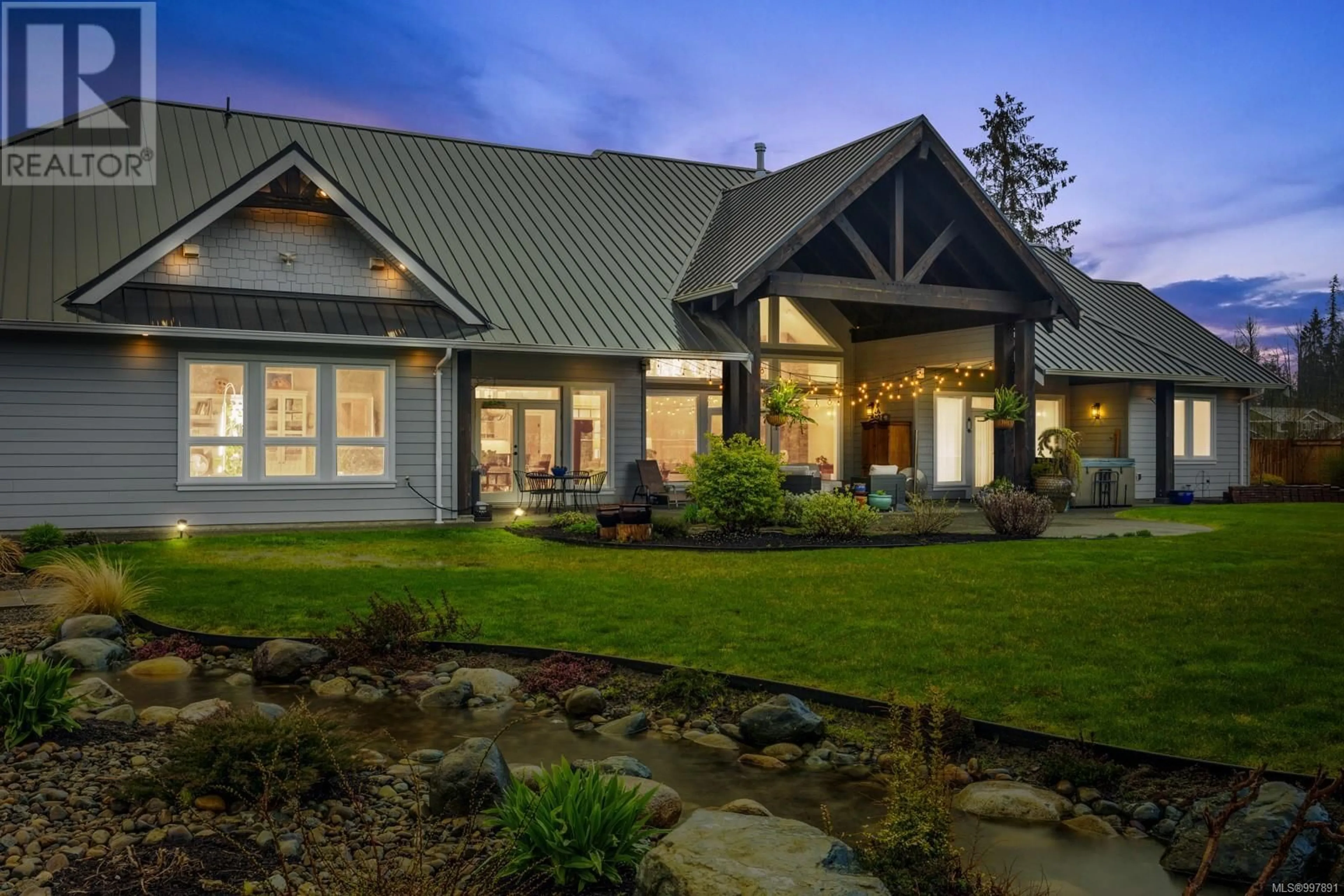 Home with vinyl exterior material, mountain view for 8757/8761 OYSTER RIVER WAY, Black Creek British Columbia V9J1K5