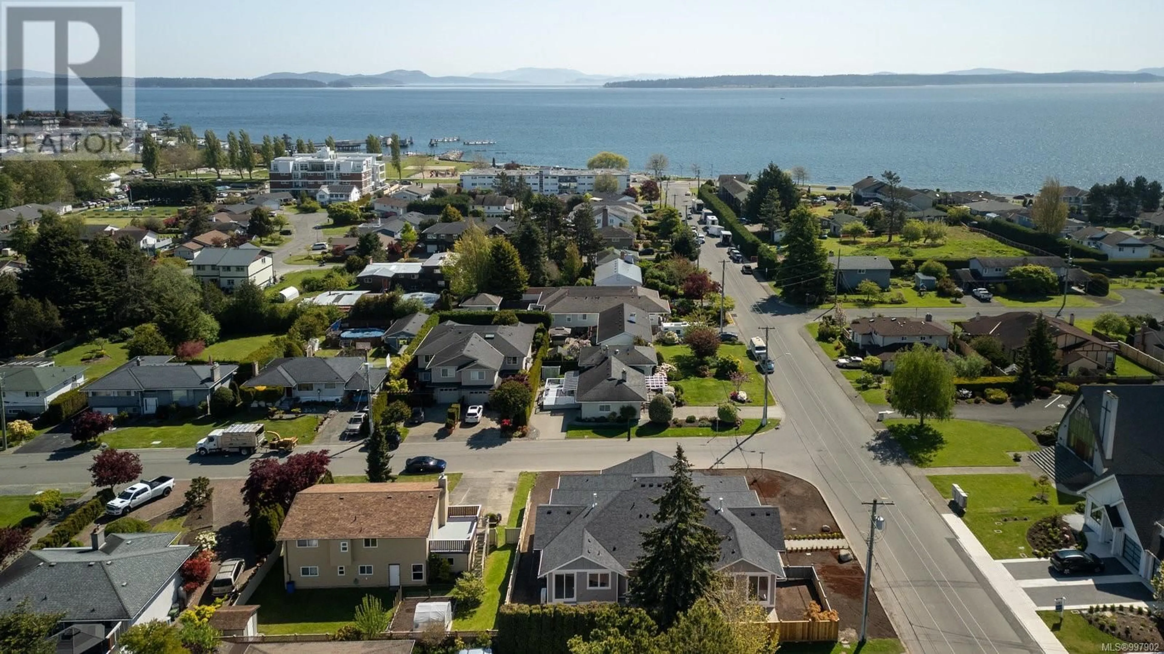 A pic from outside/outdoor area/front of a property/back of a property/a pic from drone, water/lake/river/ocean view for 9556 NORTHLAWN TERRACE, Sidney British Columbia V8L1R8