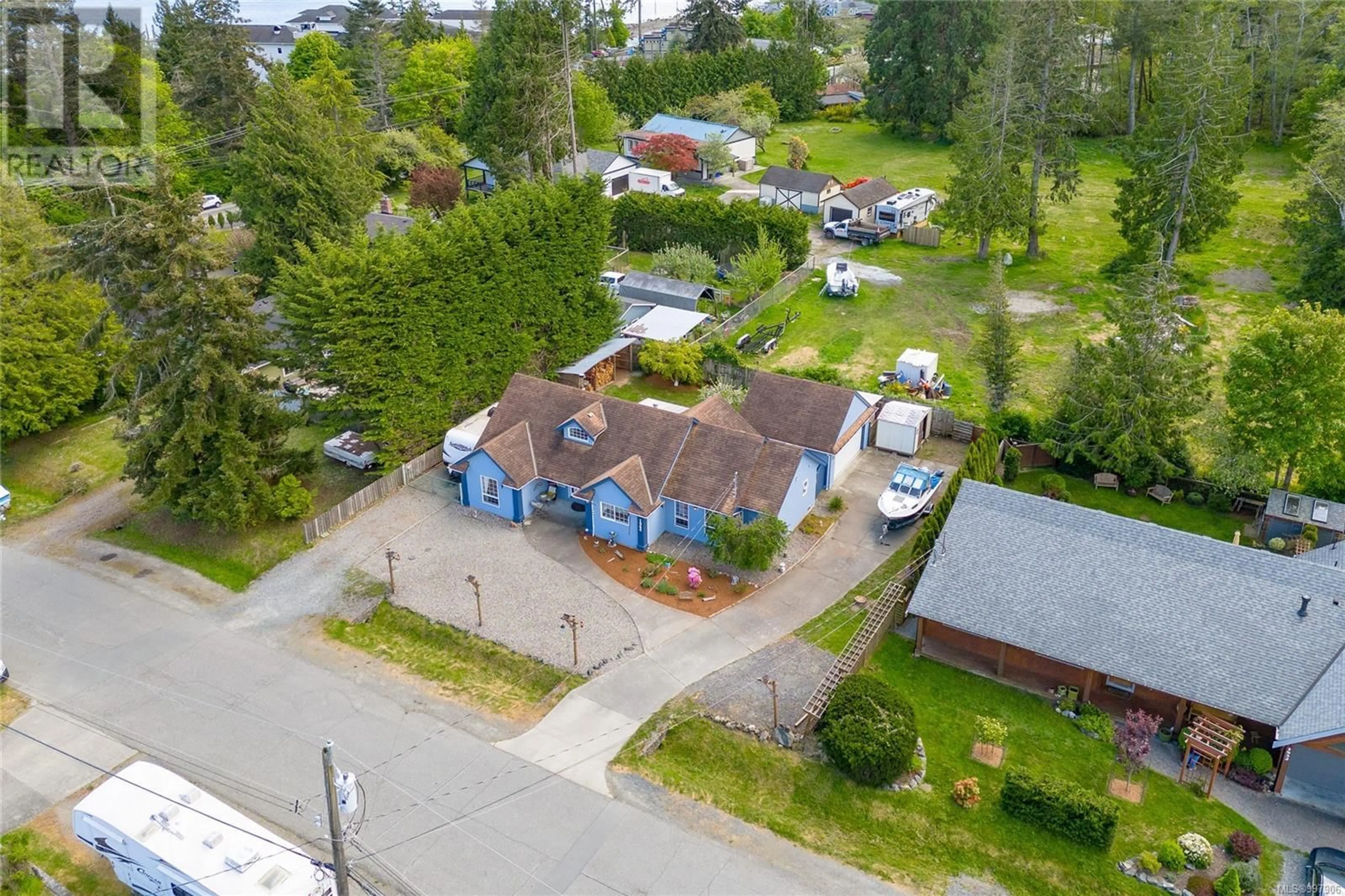 A pic from outside/outdoor area/front of a property/back of a property/a pic from drone, street for 1846 TOMINNY ROAD, Sooke British Columbia V0S1N0