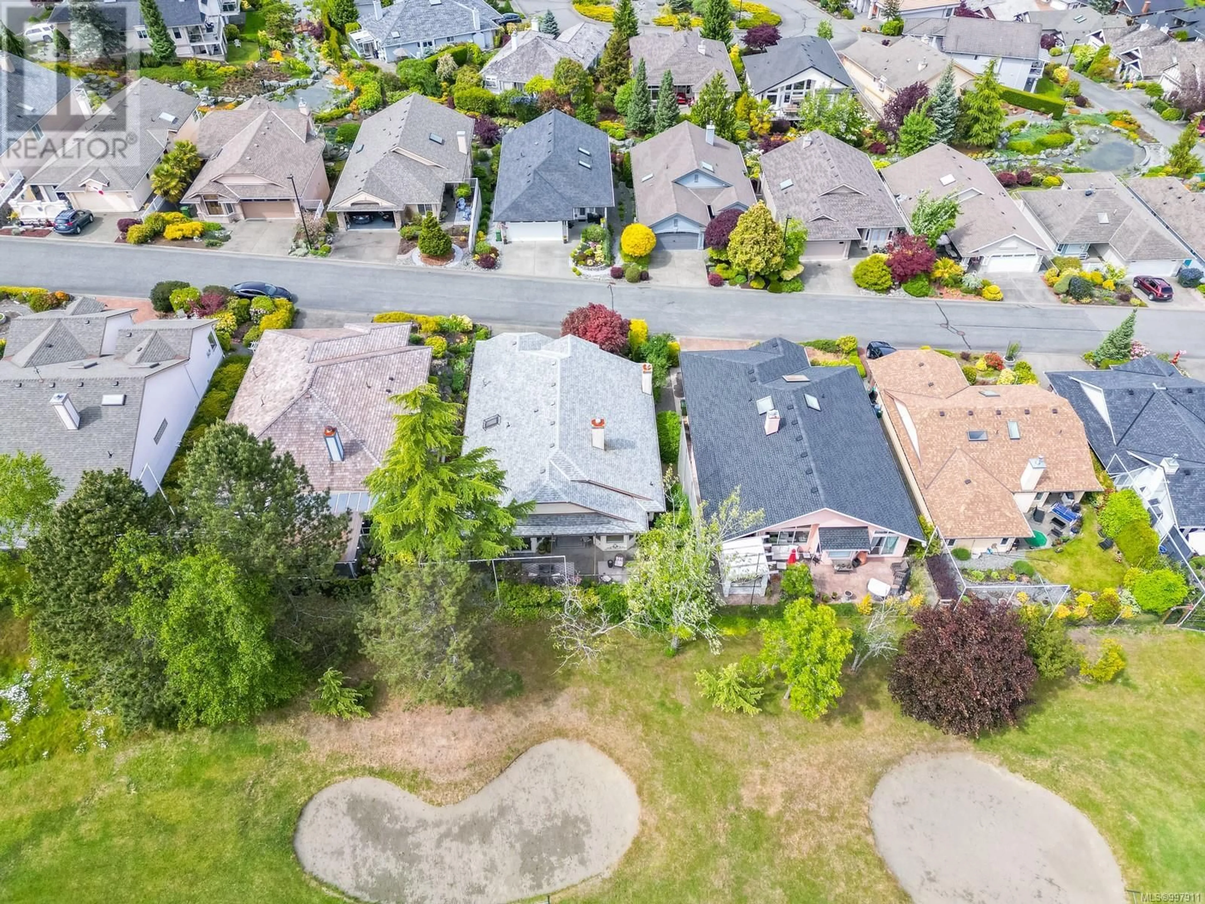 A pic from outside/outdoor area/front of a property/back of a property/a pic from drone, street for 809 COUNTRY CLUB DRIVE, Cobble Hill British Columbia V0R1L1
