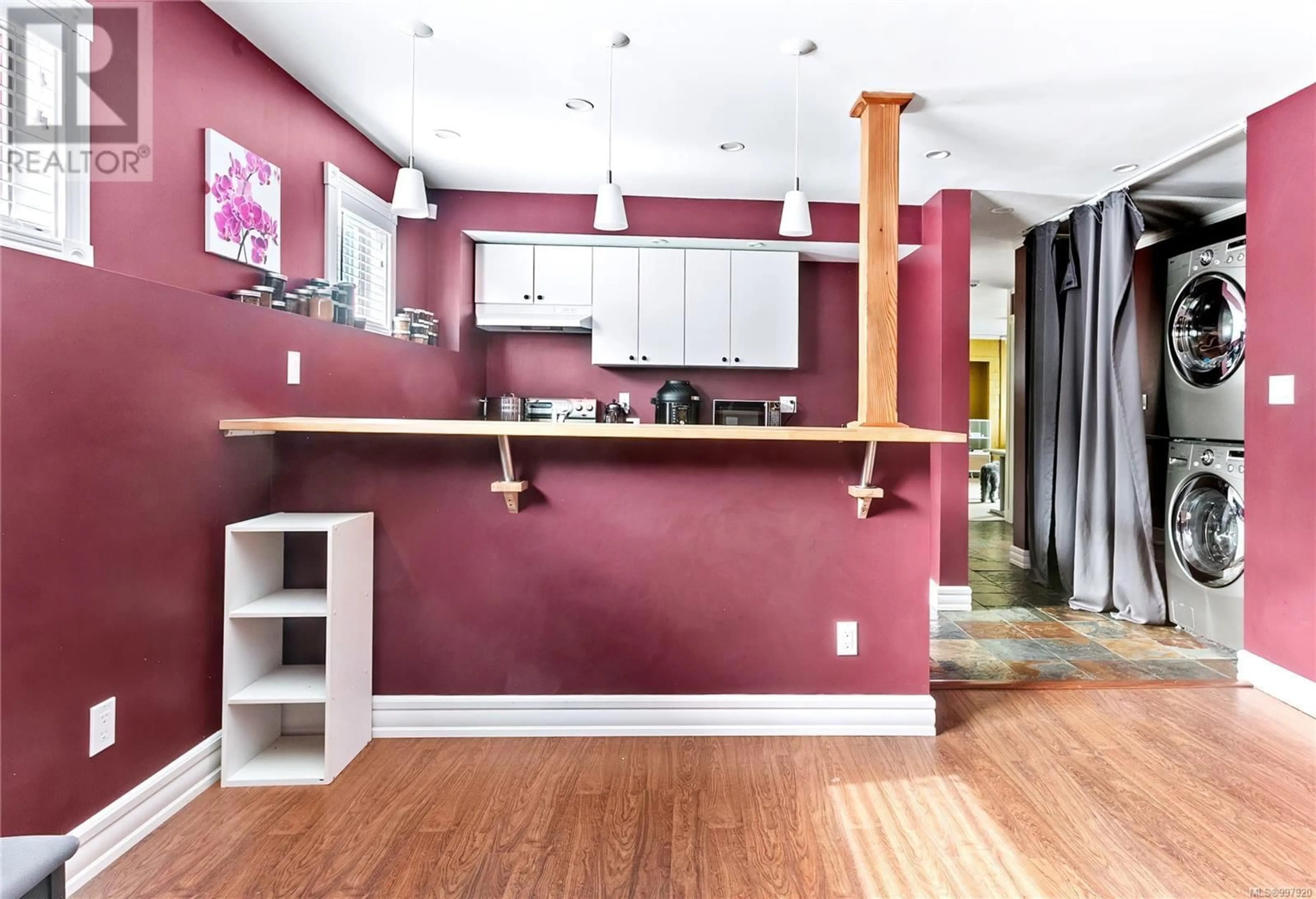 Open concept kitchen, wood/laminate floor for 4262 CAREY ROAD, Saanich British Columbia V8Z4H2